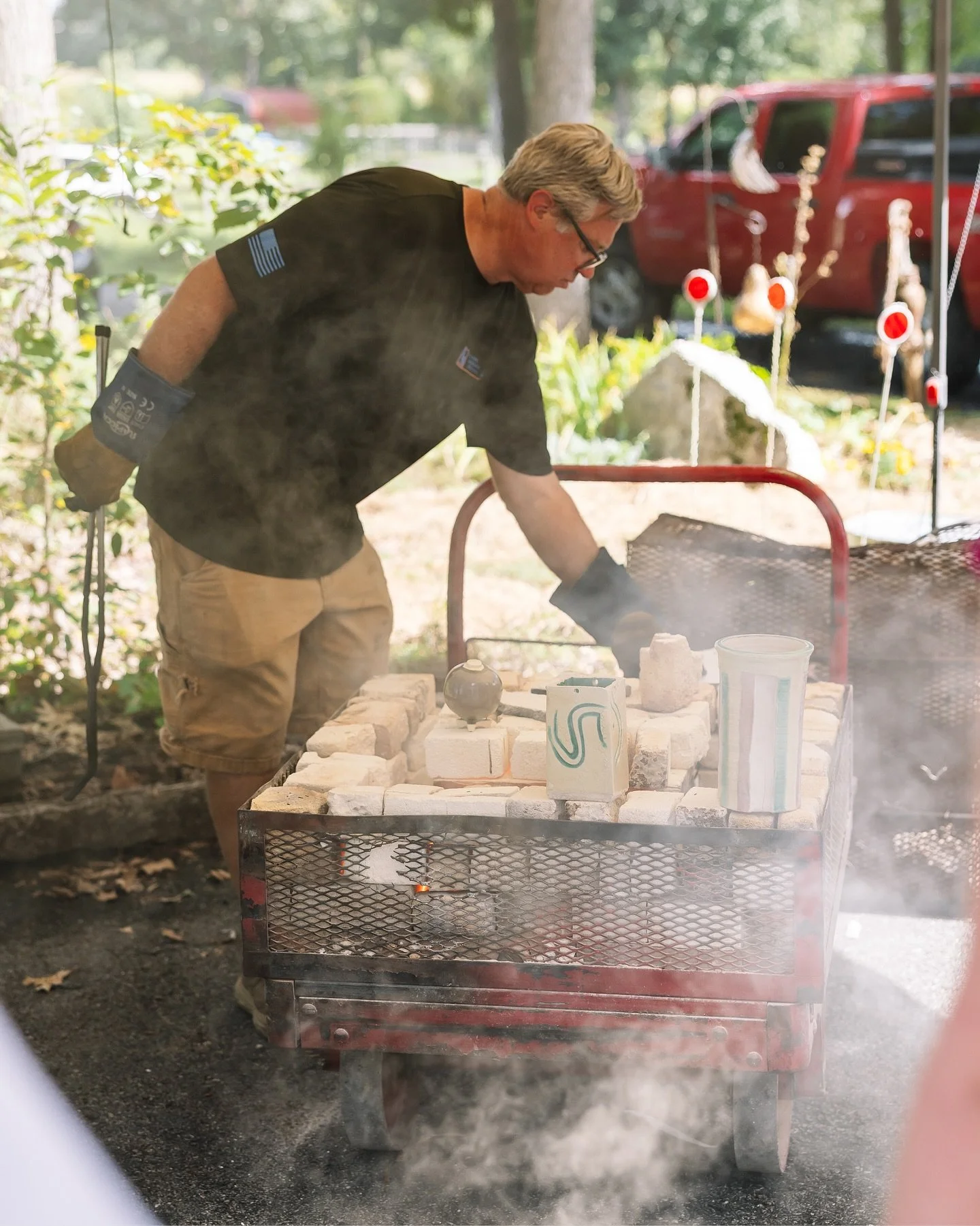 Over the weekend I photographed my friends Sarah + Scott as they fired their Raku pieces with their pottery studio. I really love documenting a process of something. Even though this set was for fun, I&rsquo;m really proud of how these photos came ou