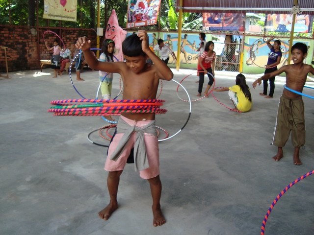 boy with hula hoops.jpeg