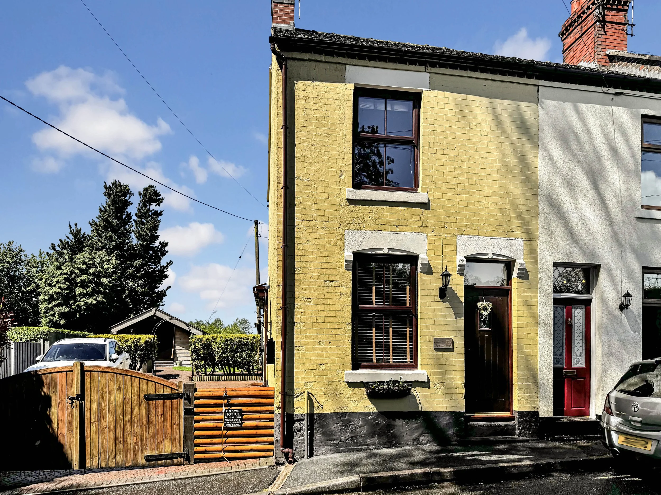 Charming yellow Victorian end terrace cottage in Dunkirk, Bignall End with private driveway, wooden gates and countryside surroundings