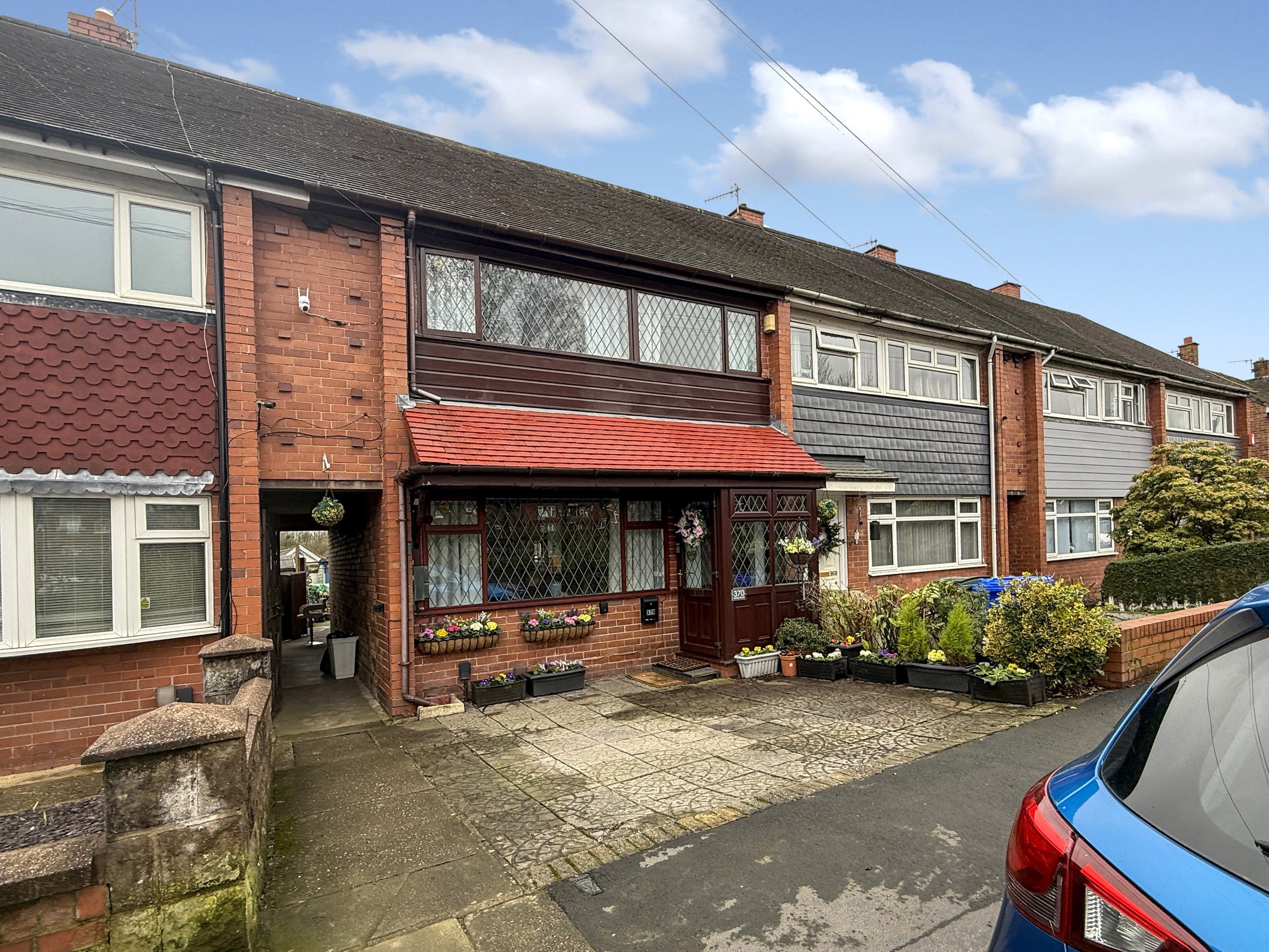 Three bedroom town house for sale on Dividy Road Berryhill Stoke-on-Trent with off road parking and enclosed front garden