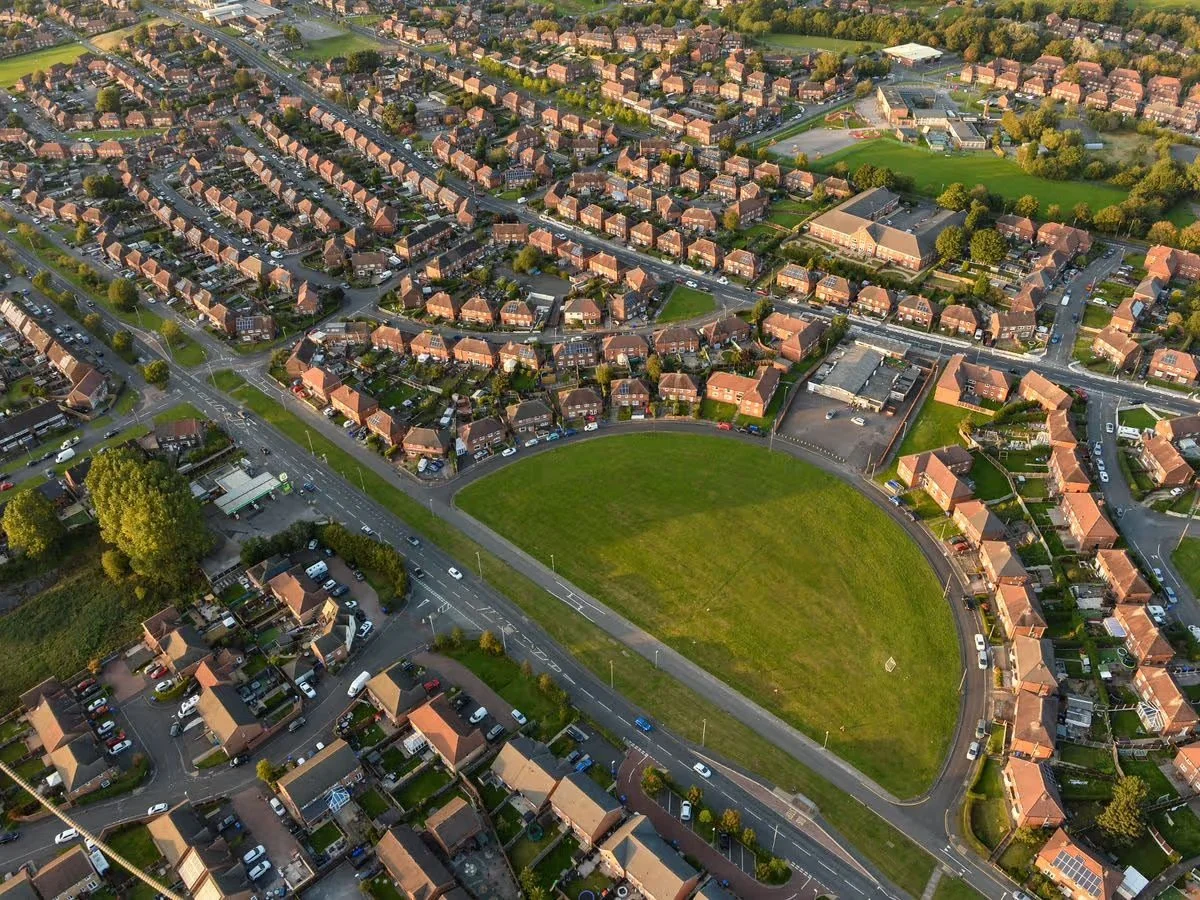 Aerial view of Bentilee estate in Stoke-on-Trent showing residential streets, homes and green open spaces — ideal family community in ST2.