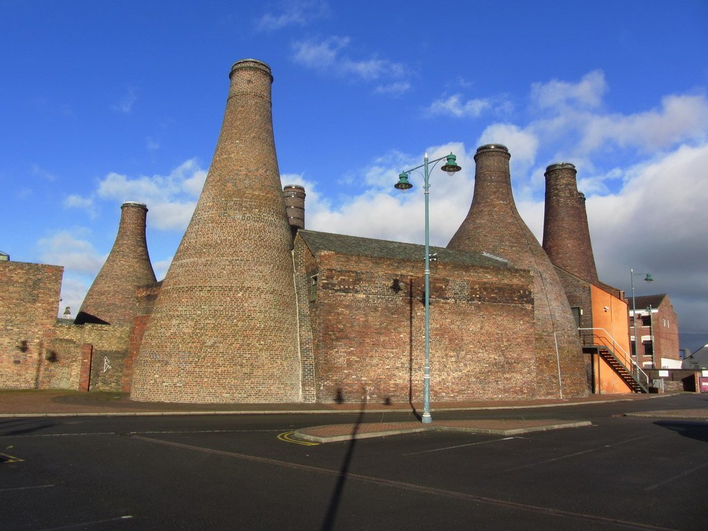 Gladstone Pottery Museum in Longton, Stoke-on-Trent – historic brick kilns and Victorian factory buildings under a blue summer sky.