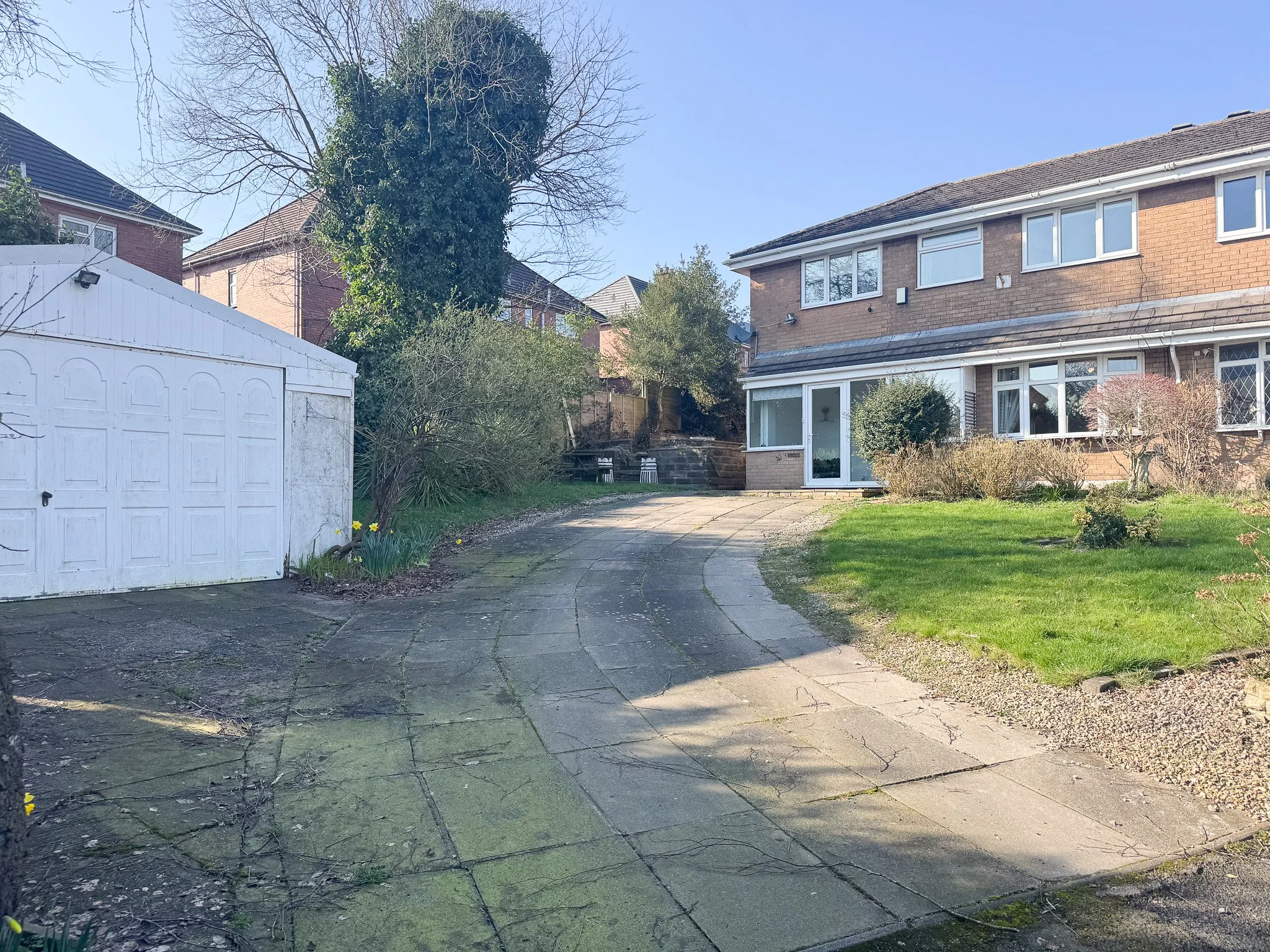 Extended semi-detached house with large driveway and detached double garage on Rogate Close, Fenpark, Stoke-on-Trent ST4 3RP