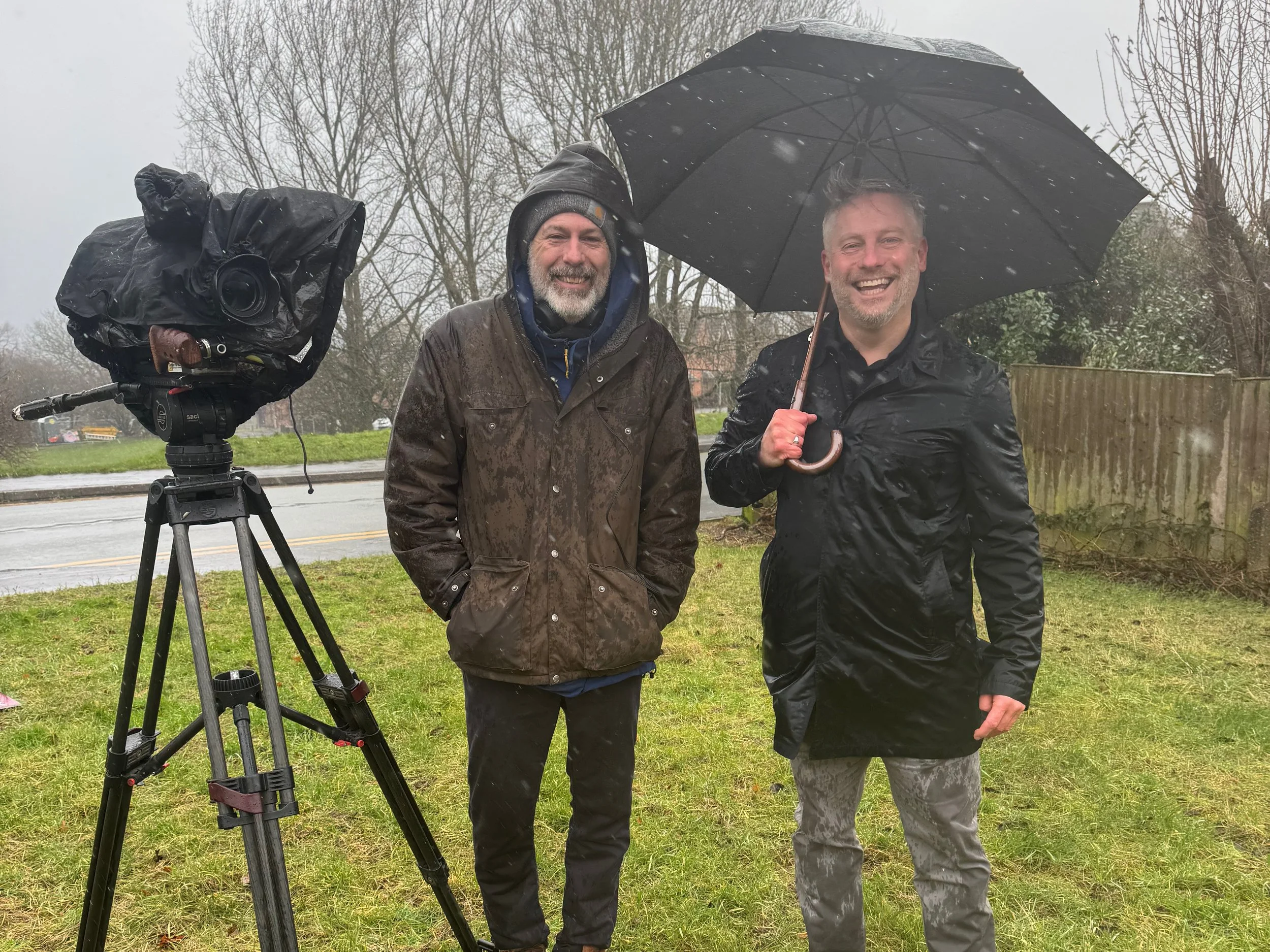 Findahome Online Managing Director Tom Williams with cameraman Damian during Homes Under the Hammer filming at Tregowan Close, Stoke-on-Trent
