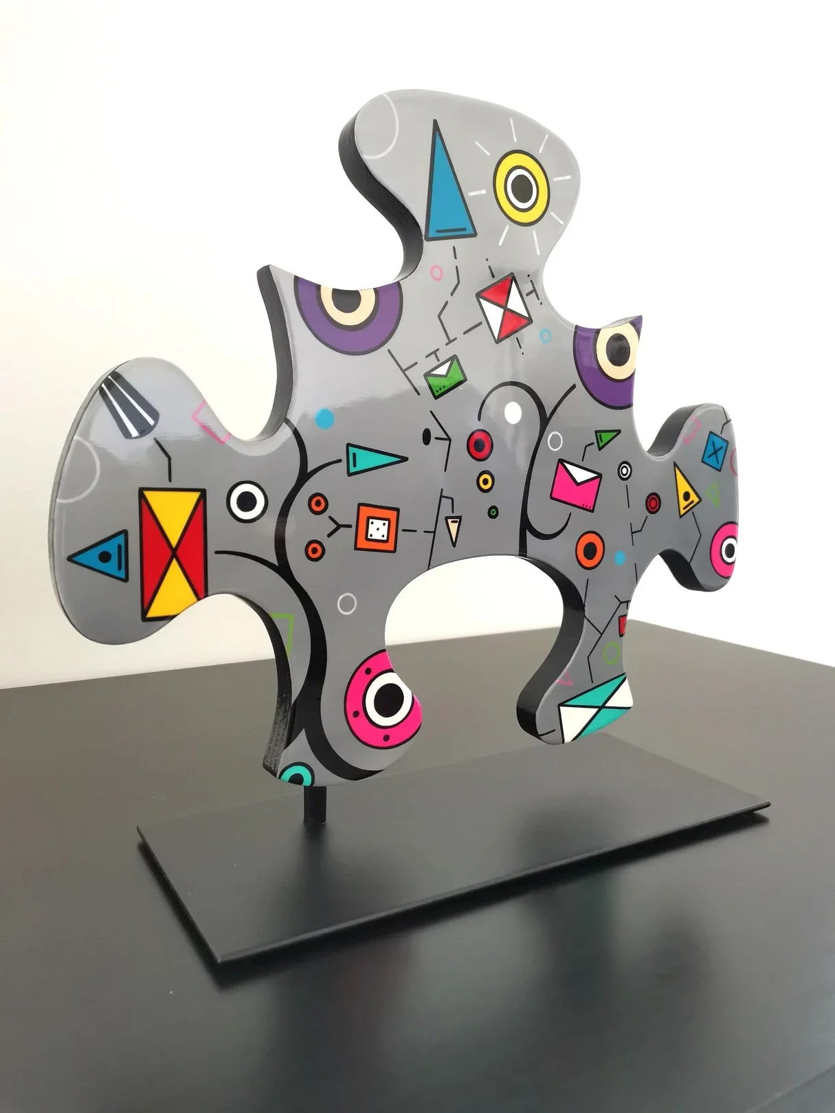 Sculpture en bois en forme de puzzle de remy demestre Galerie Graal .webp
