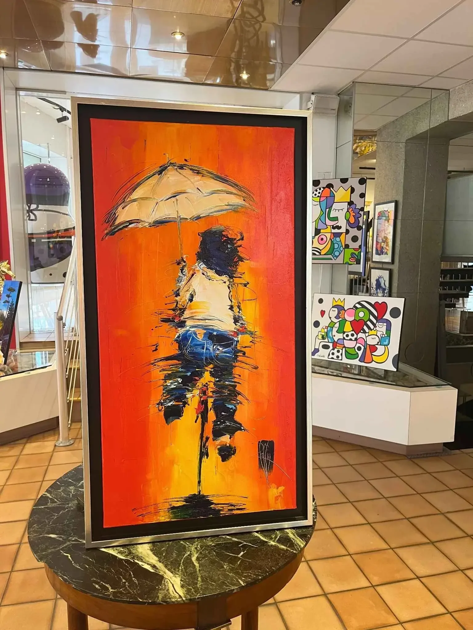 Tableau velo parapluie orange de christian raffin  Art Contemporain .webp