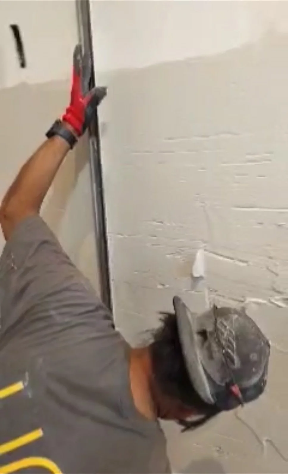 Flanking plaster with straight edge across wall