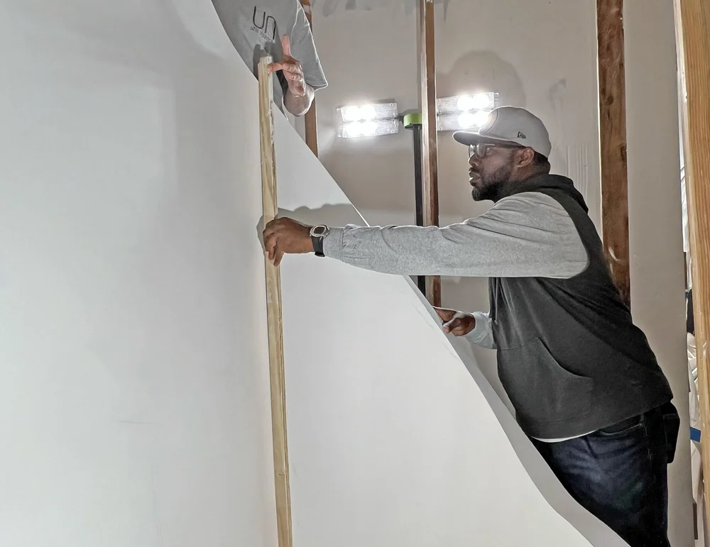 Artisan checking a curved surface