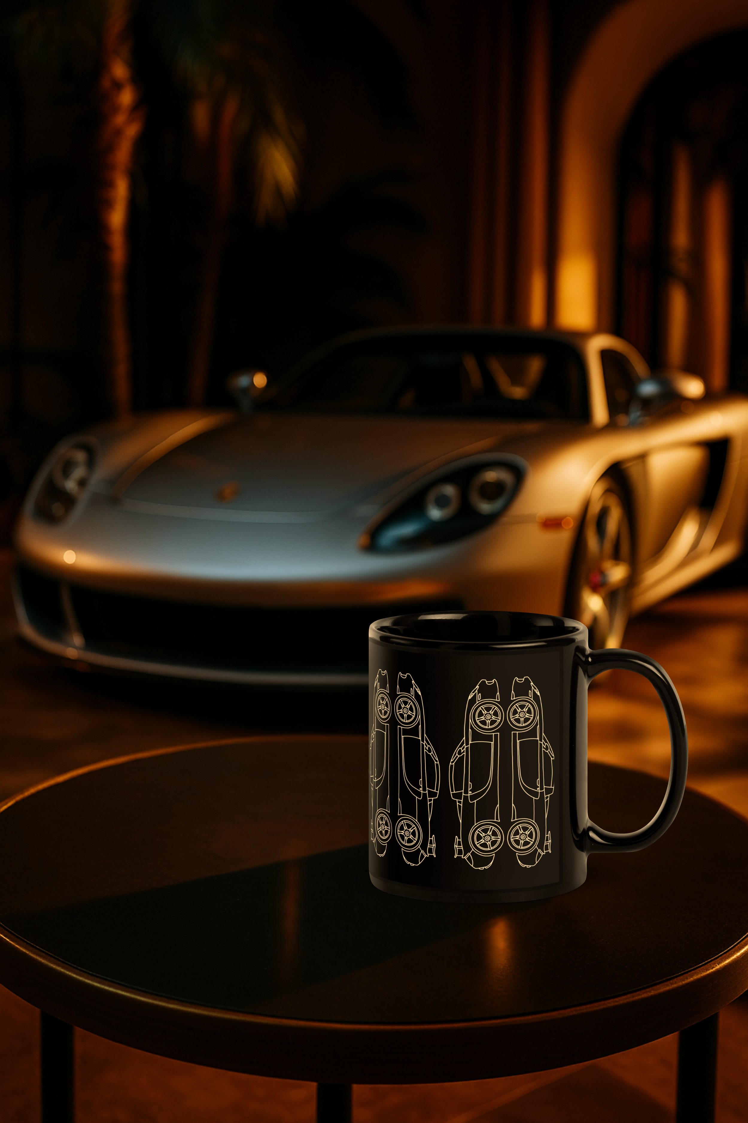 A silver sports car parked indoors near a small table with a black mug featuring car outlines.