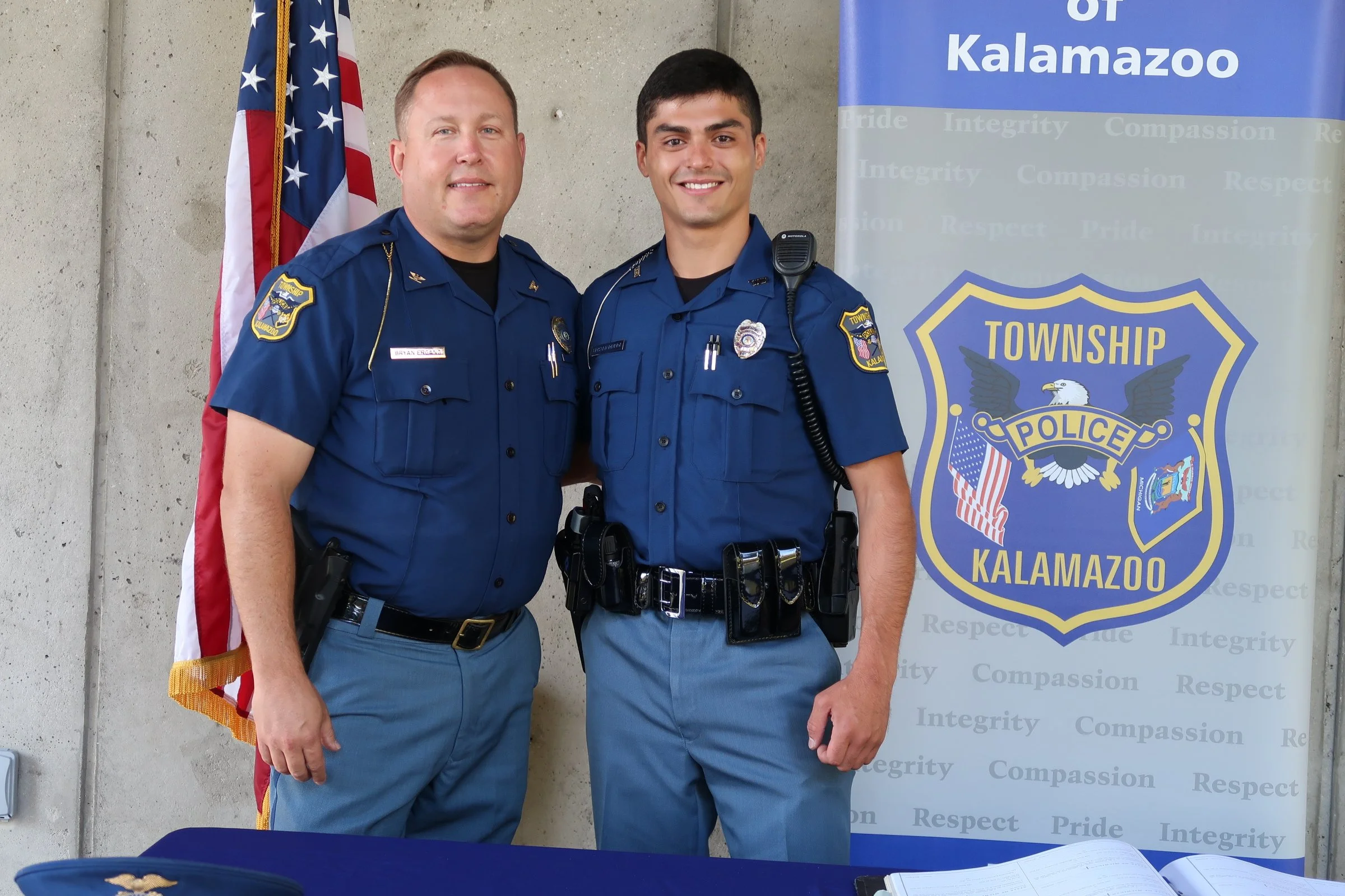 Two officers at swearing-in ceremony