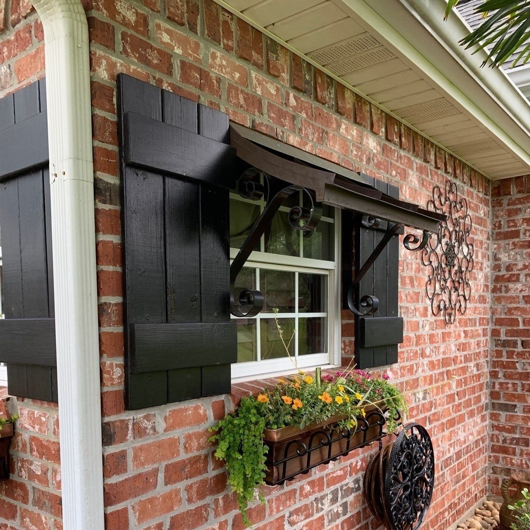 metal+awning+and+wood+shutters.jpg