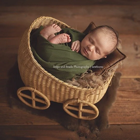 At 10lbs, he was the perfect baby to try out my new carriage prop today! Cute, cozy and comfortable! 💚 
#MartinsburgPhotographer
#hagerstownphotographer
#chambersburgphotographer
#waynesborophotographer
#theoriginalphotoblocksprops
#newbornphotograp