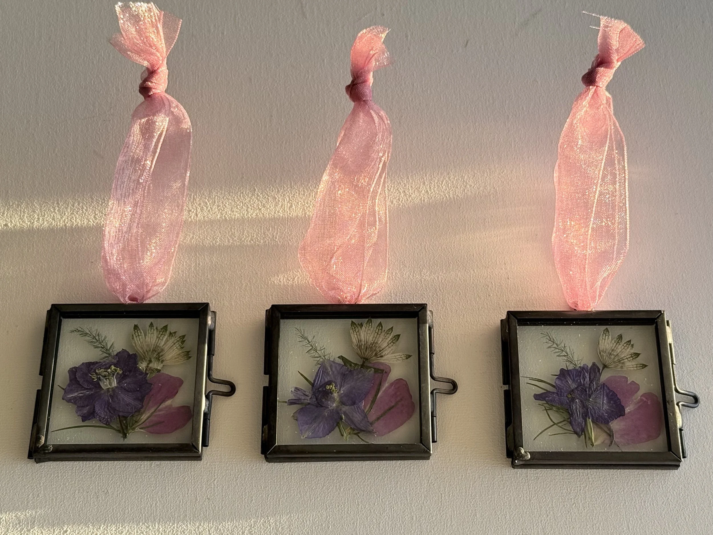 Pressed wedding bouquet preserved in glass ornaments