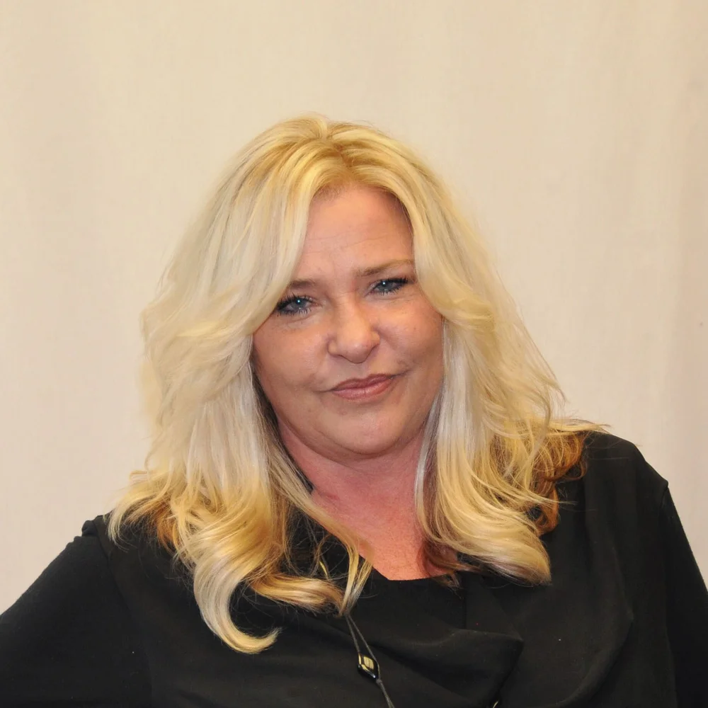 Joanne Rourke About Us — Ella Rae Salon & Upstairs Collection