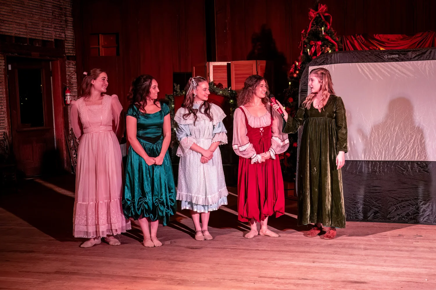 The March sisters on stage.