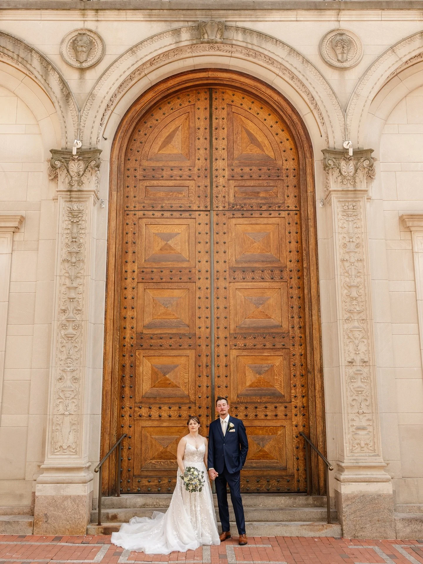 When your venue has a gorgeous door like this, you take full advantage of using it during portraits