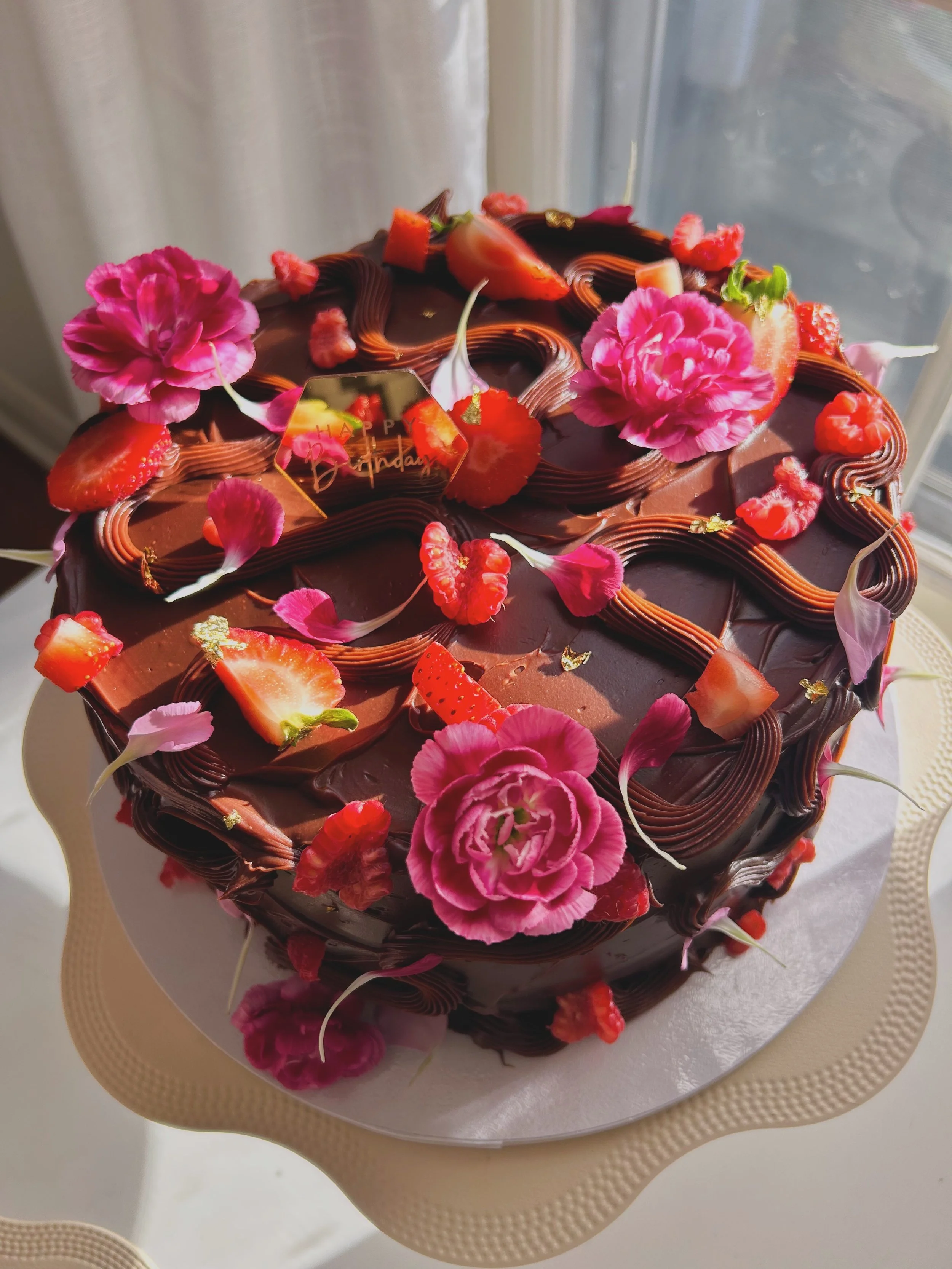 Double chocolate cake with mixed berries