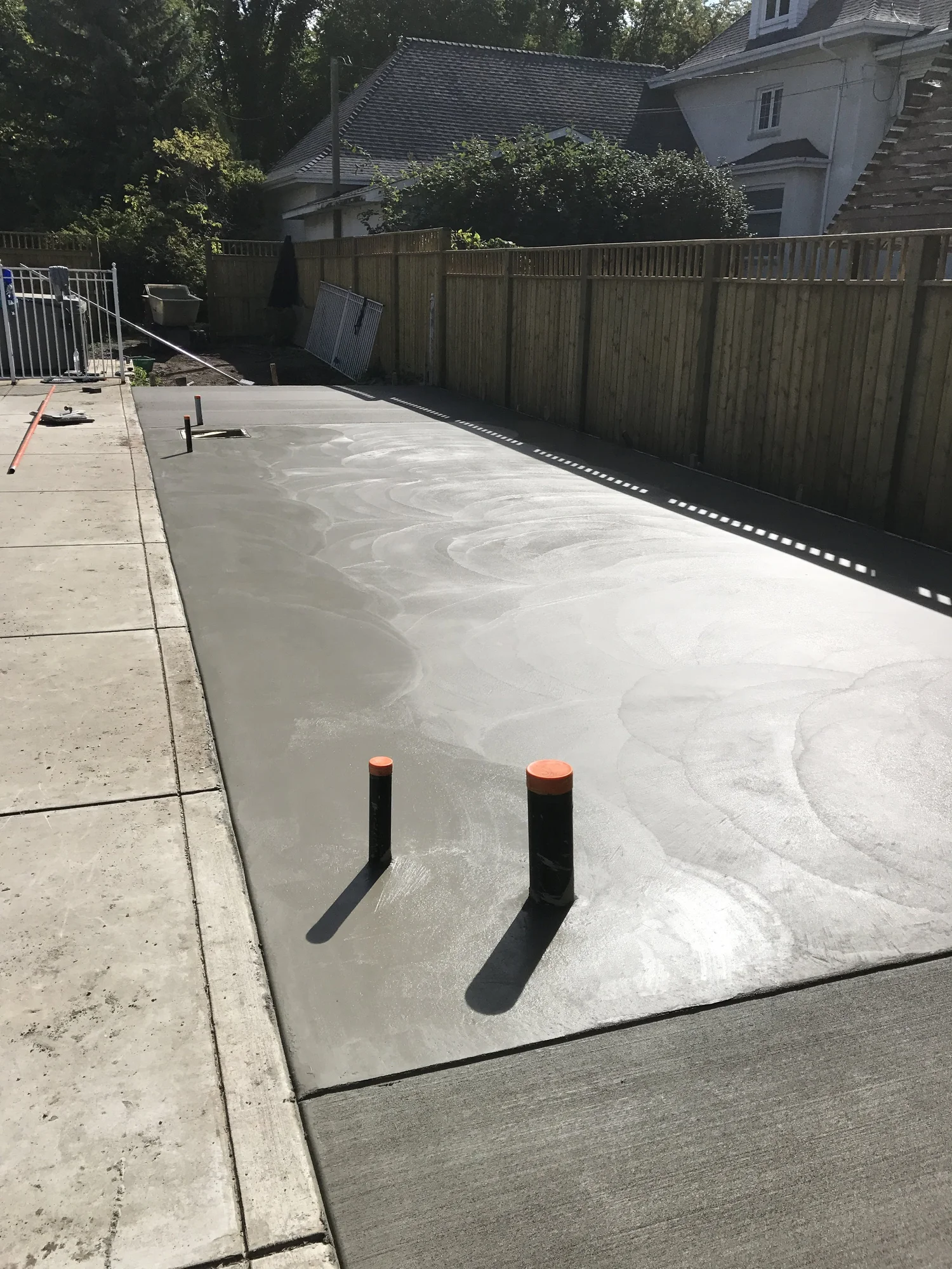 Wide concrete patio and walkway pour