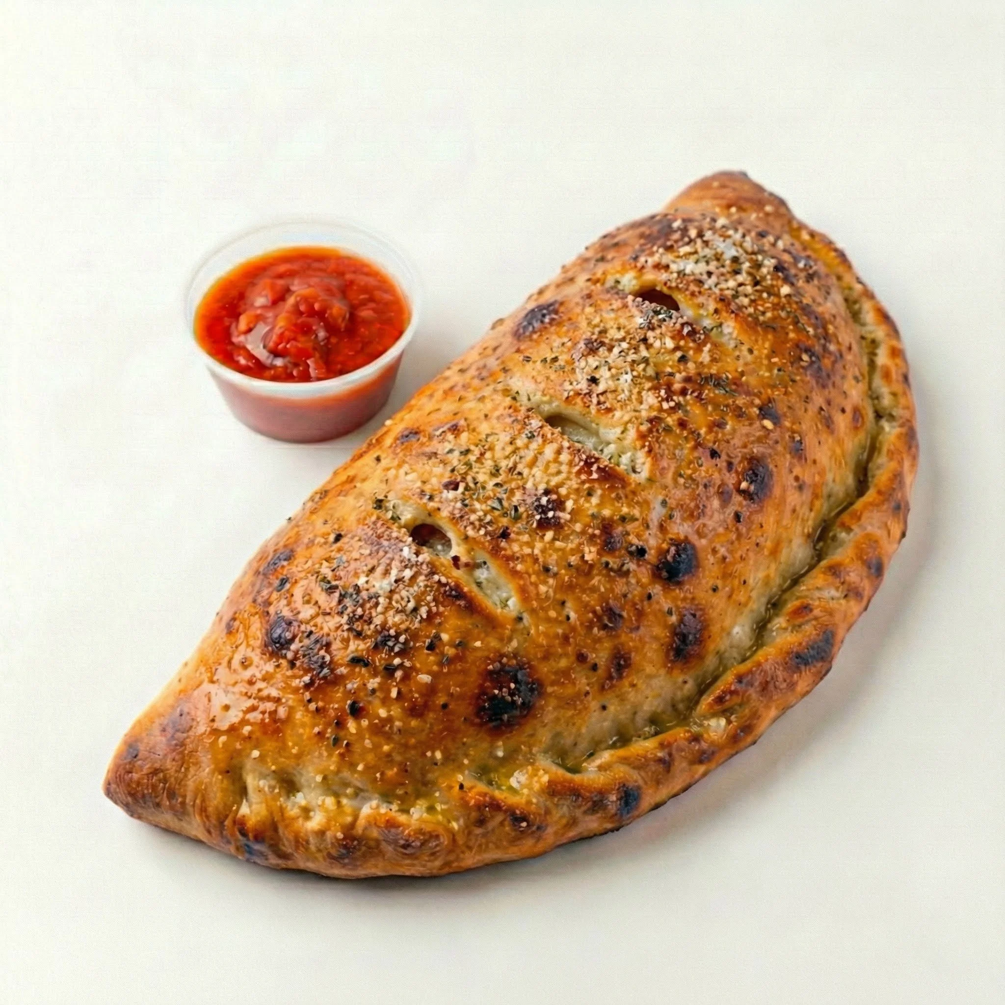 The Microbus – Mediterranean style with artichoke hearts, roasted red peppers, mushrooms, black olives, feta, pesto, served with marinara