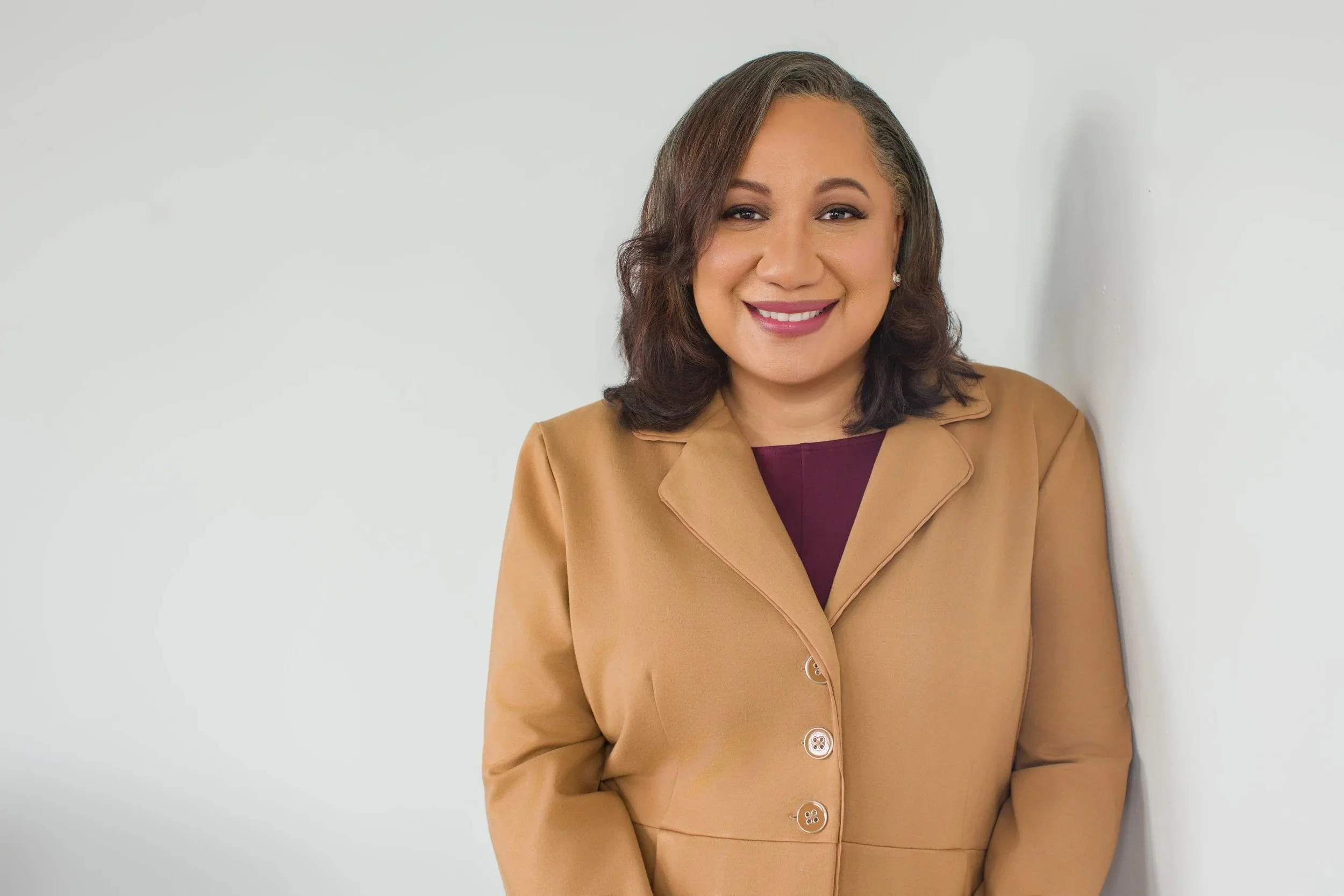 meet-the-bryants-san-antonio-texas-professional-headshot-woman-camel-blazer-portrait.webp
