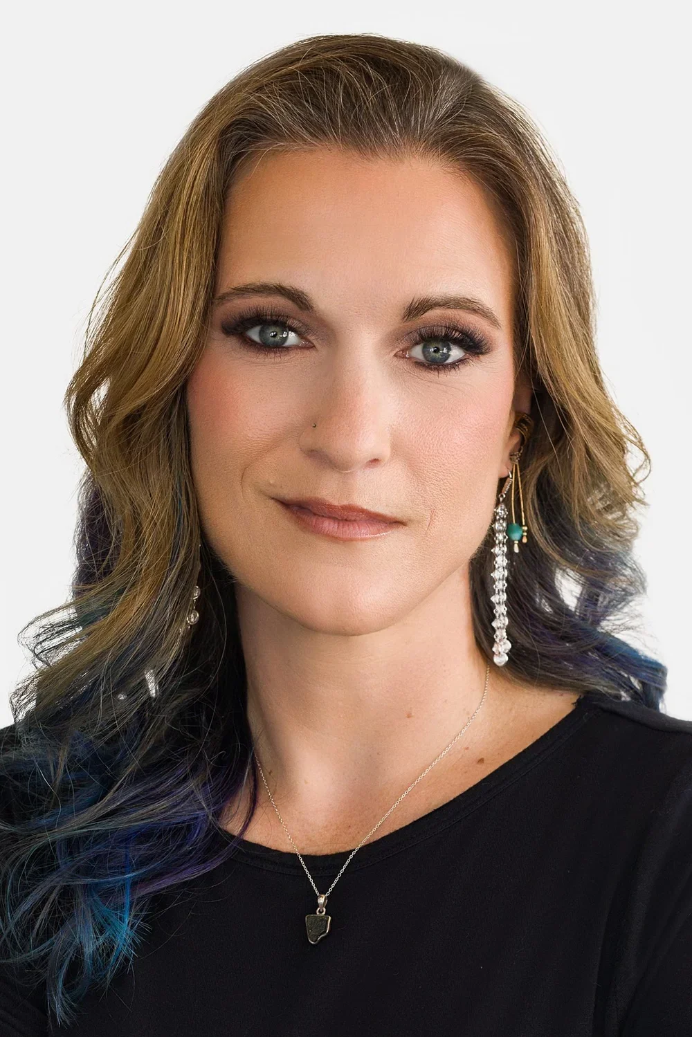 Leigh A. review highlighting a fun, professional experience with Meet the Bryants, feeling valued, confident, and respected during her San Antonio headshot session.