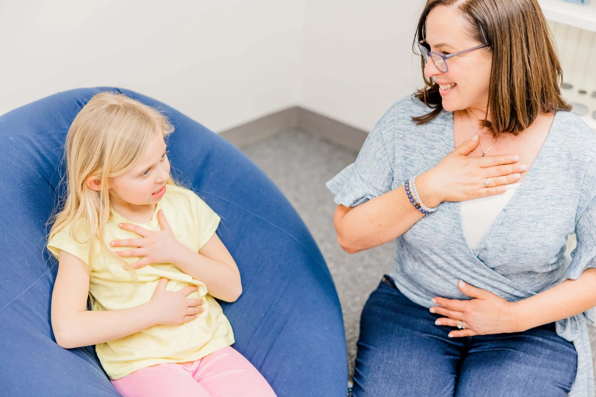 Jill Vetstein sitting in her Natick MA office with a child therapist session