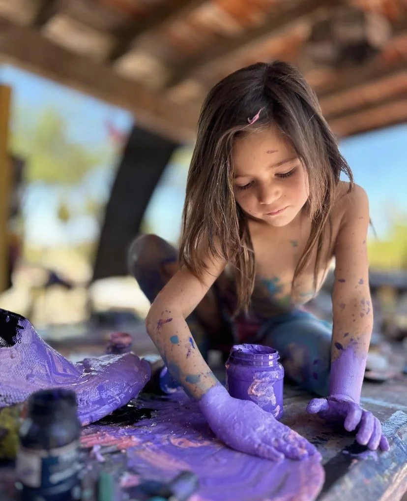Kids paint their own canvas at a family art retreat in San Miguel de Allende