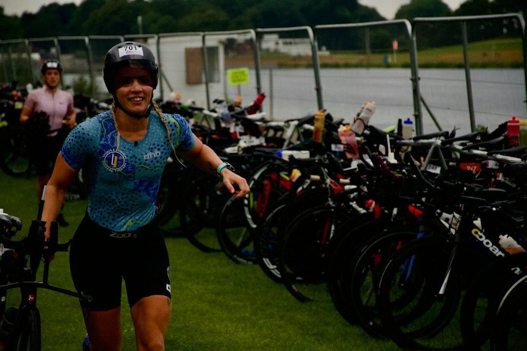 person running next to bike