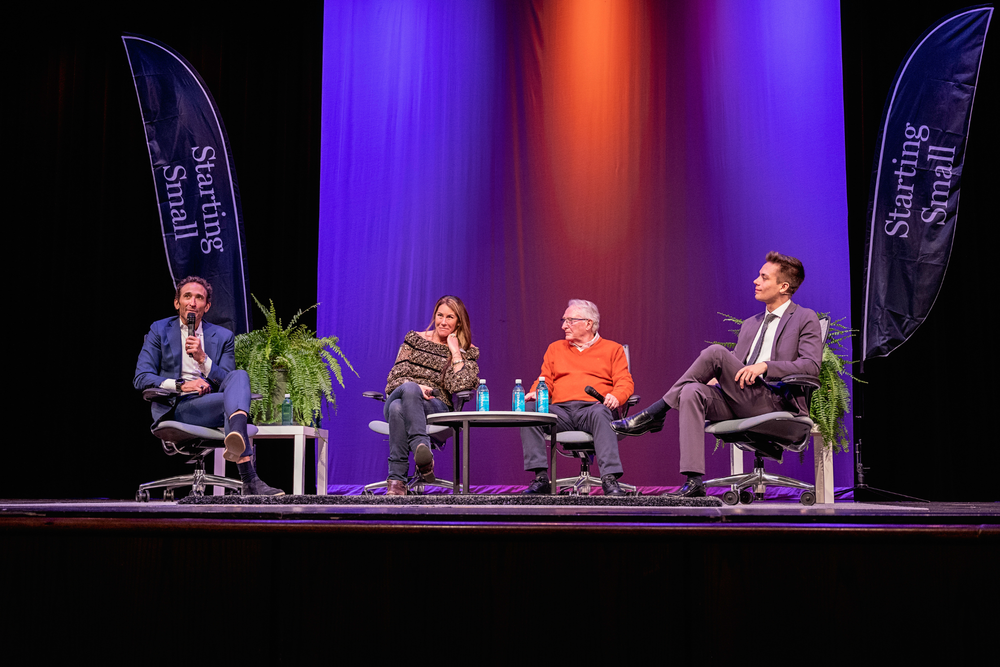 Four people in conversation on the 2022 summit stage