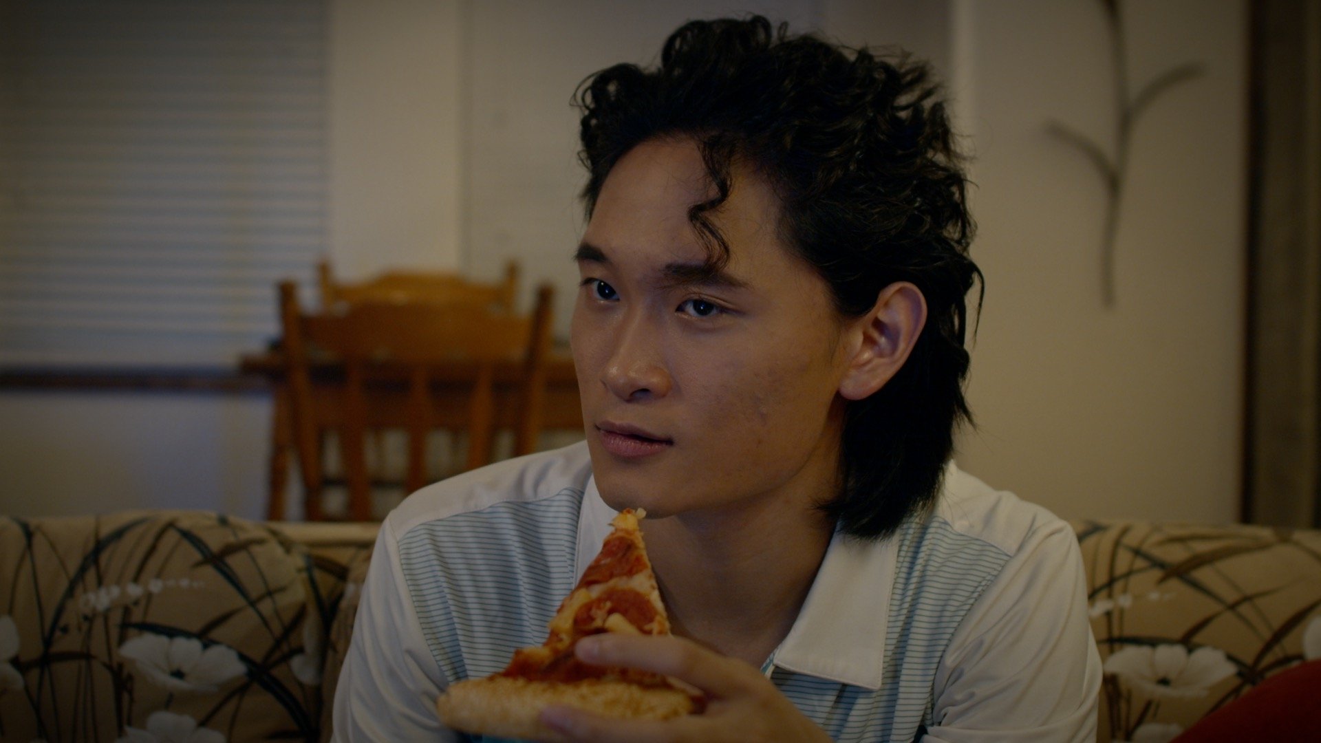 Justin with pizza.jpg