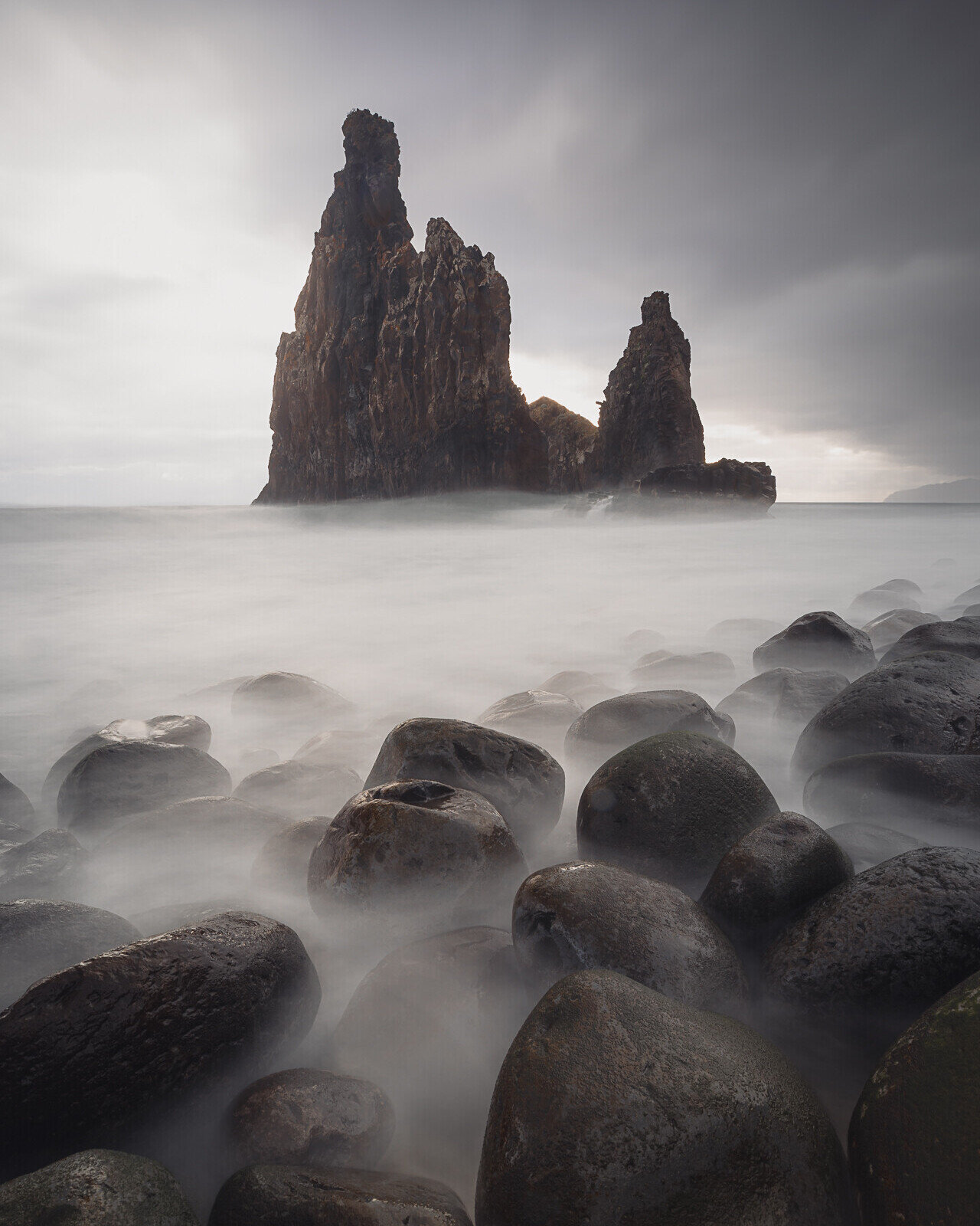Ilh&eacute;u stands for a 'little island' or 'islander' in portuguese.

To me one of the most fascinating aspects of photography has always been playing with moving water and long exposures. Standing in the raging waters of the Atlantic in northern p