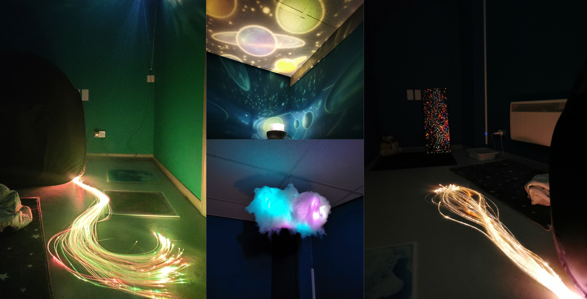 Calm room with dark lighting featuring various colorful light and fiber optic displays, including spinning fiber optic strands, a cloud-shaped light installation, and projection artworks on the walls and ceiling.
