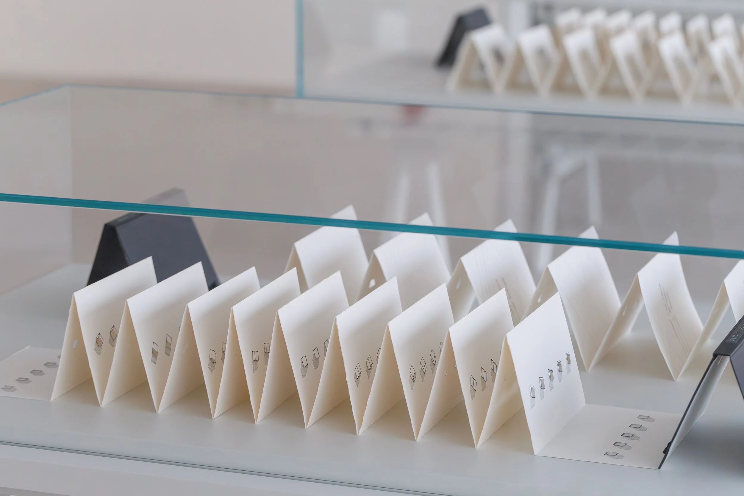 Tarek Elkassouf طارق القاصوف — Lines From Letters exhibition at Bassam Freiha Art Foundation, Abu Dhabi, UAE. Fine art drawings and leporellos featuring ink on paper, cutouts, and 22k gold leaf gilding