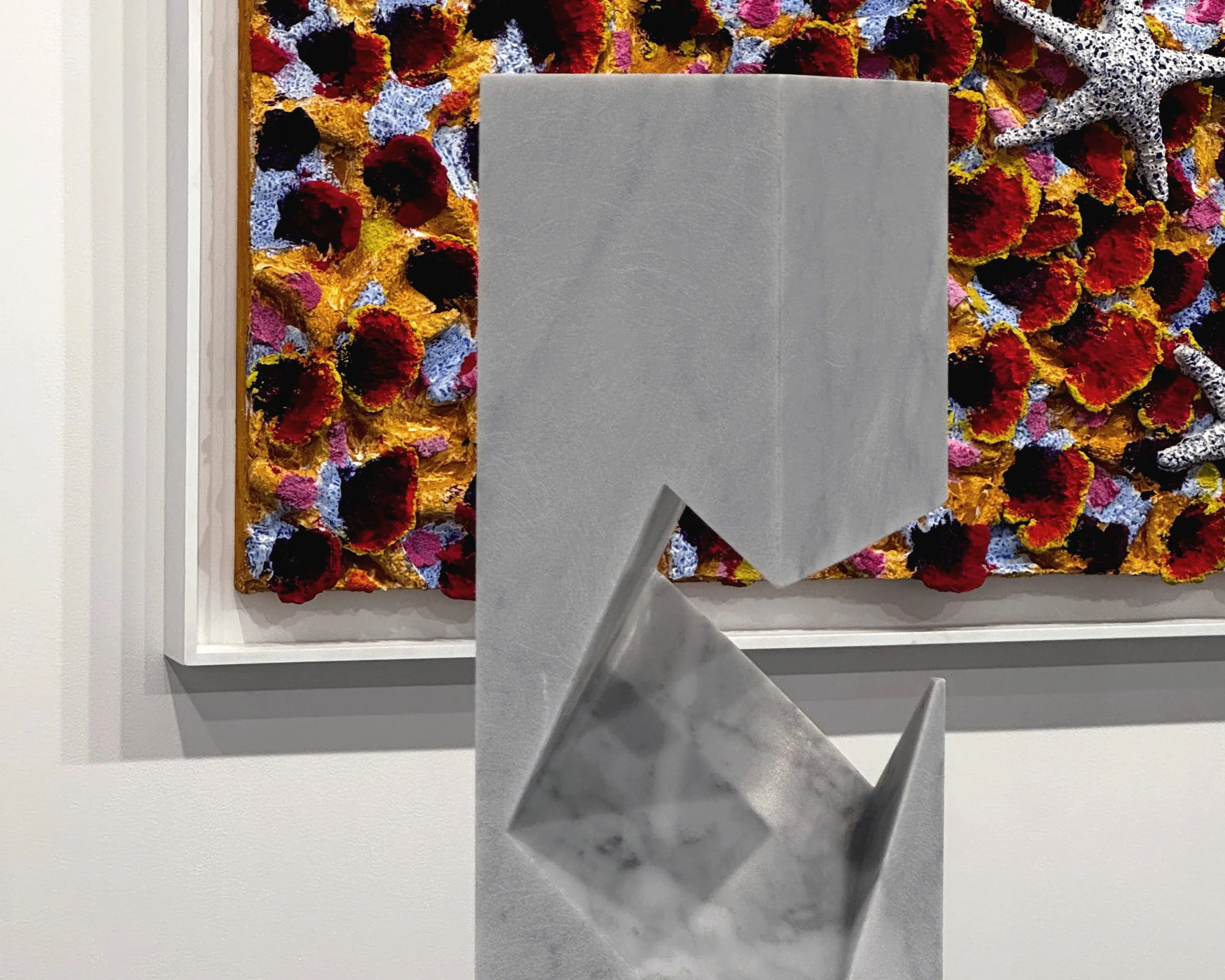 Intricate marble carving by Tarek Elkassouf طارق القاصوف. Questions series sculpture where the void gives weight to the stone form.