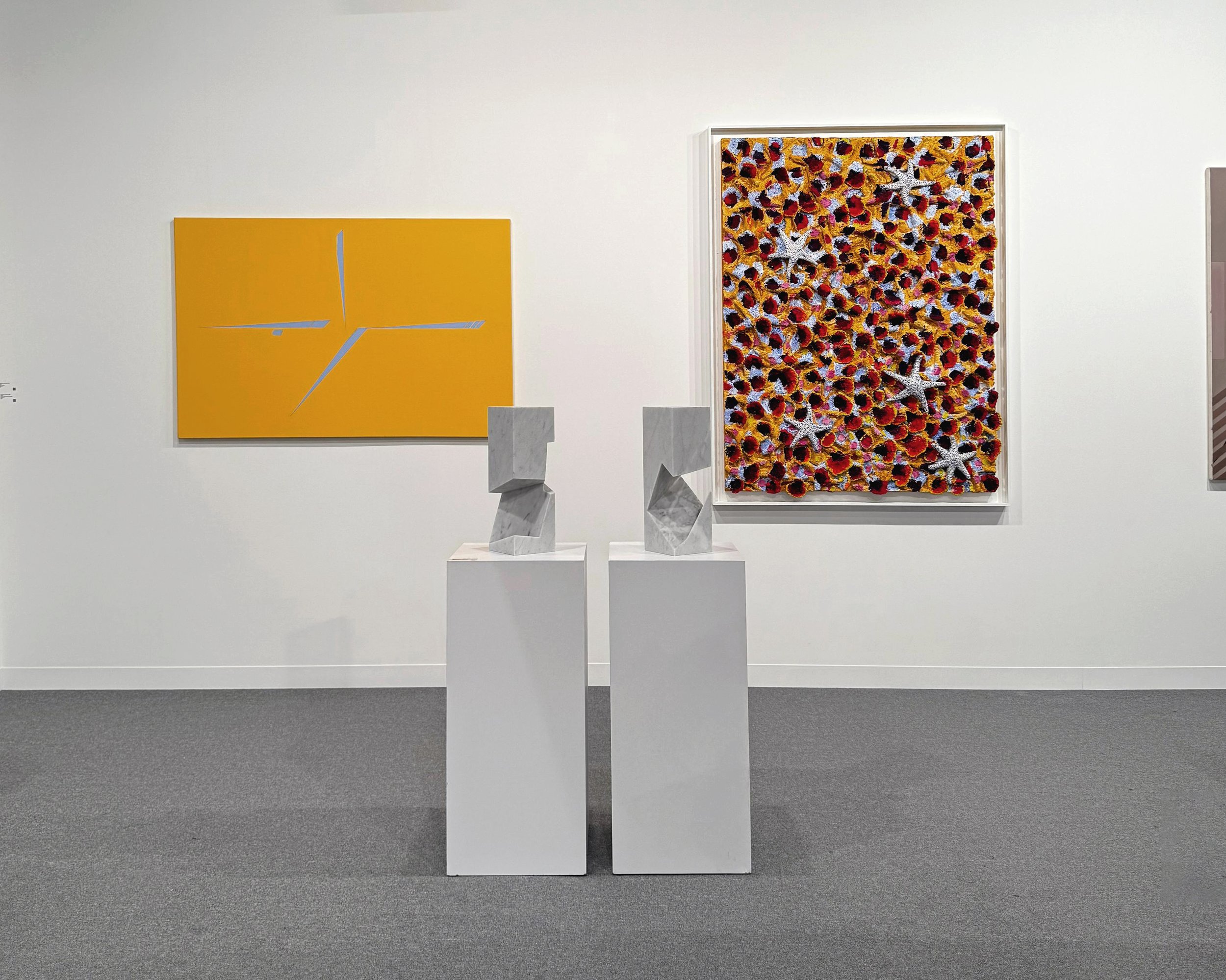 Questions series by Tarek Elkassouf طارق القاصوف. Installation view of minimalist sculptures exhibited at Art Abu Dhabi, exploring the void and presence.