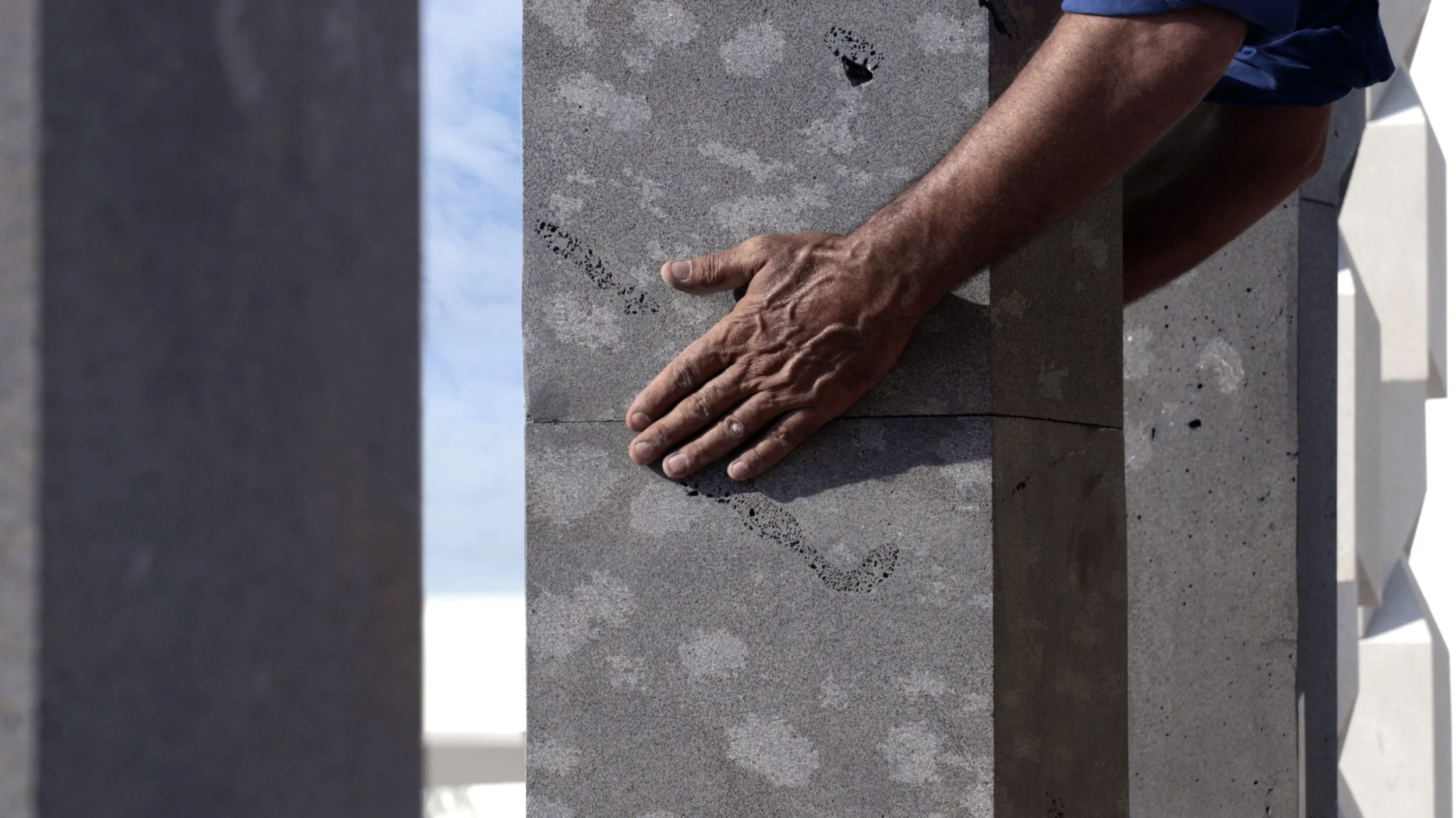 Tarek Elkassouf طارق القاصوف — Transformative Energy, record-breaking large-scale public artwork Jubail Island, Abu Dhabi. Monumental UAE installation, six pillars, limestone and basalt, first permanent sculpture of Jubail Public Art Programme.