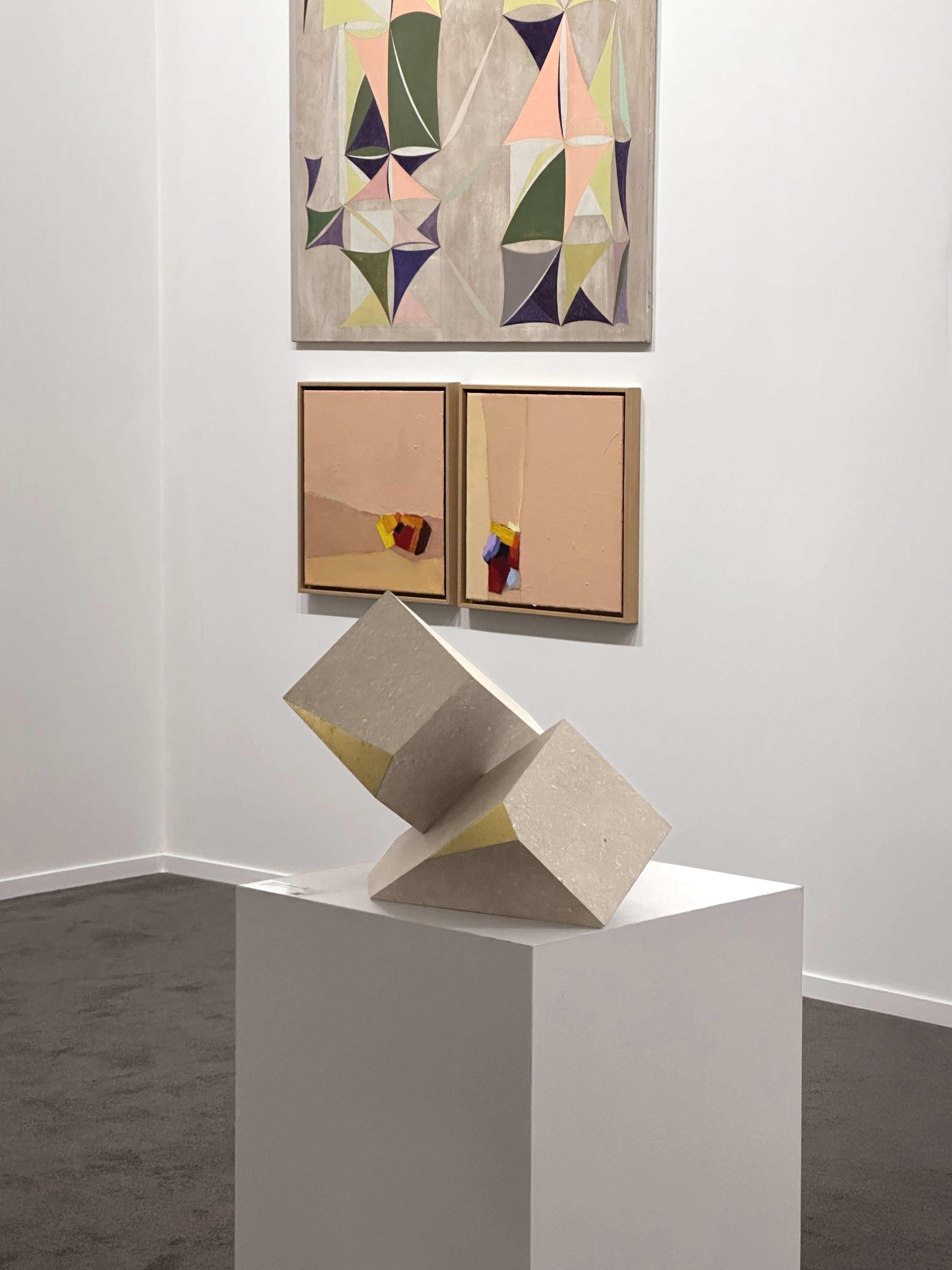 Tarek Elkassouf طارق القاصوف — Attachments exhibition at Art Dubai, UAE. Hand-carved limestone and 22k gold leaf sculptures exploring the tension between holding on and letting go.