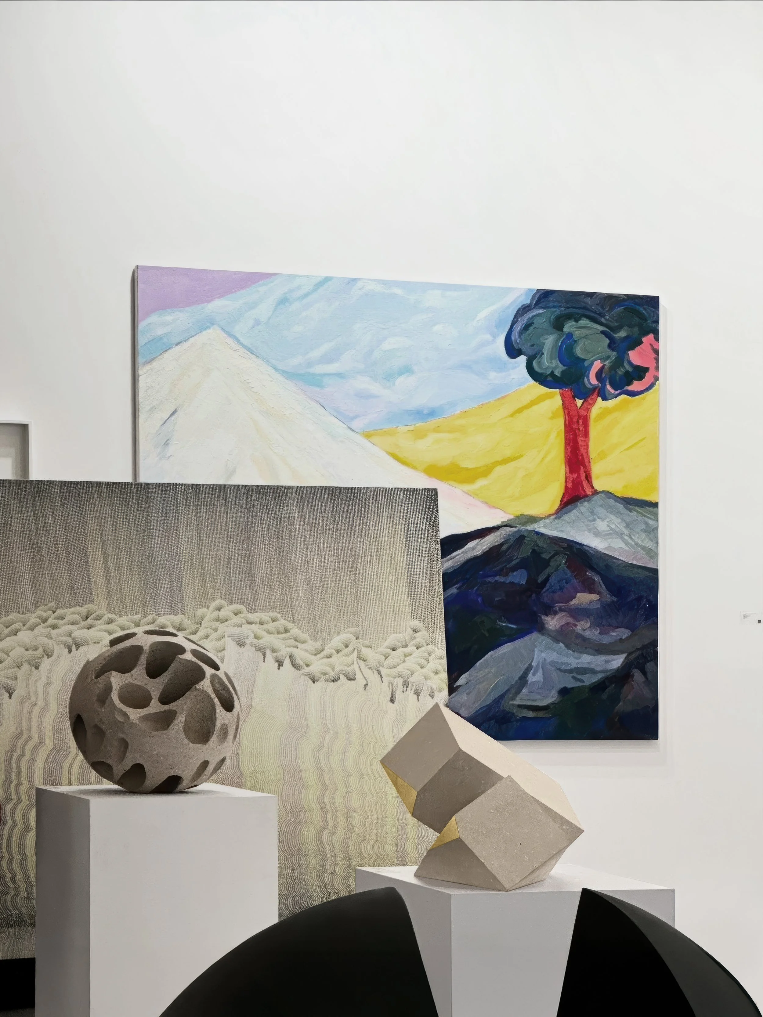 Tarek Elkassouf طارق القاصوف — Attachments exhibition at Art Dubai, UAE. Hand-carved limestone and 22k gold leaf sculptures exploring the tension between holding on and letting go.
