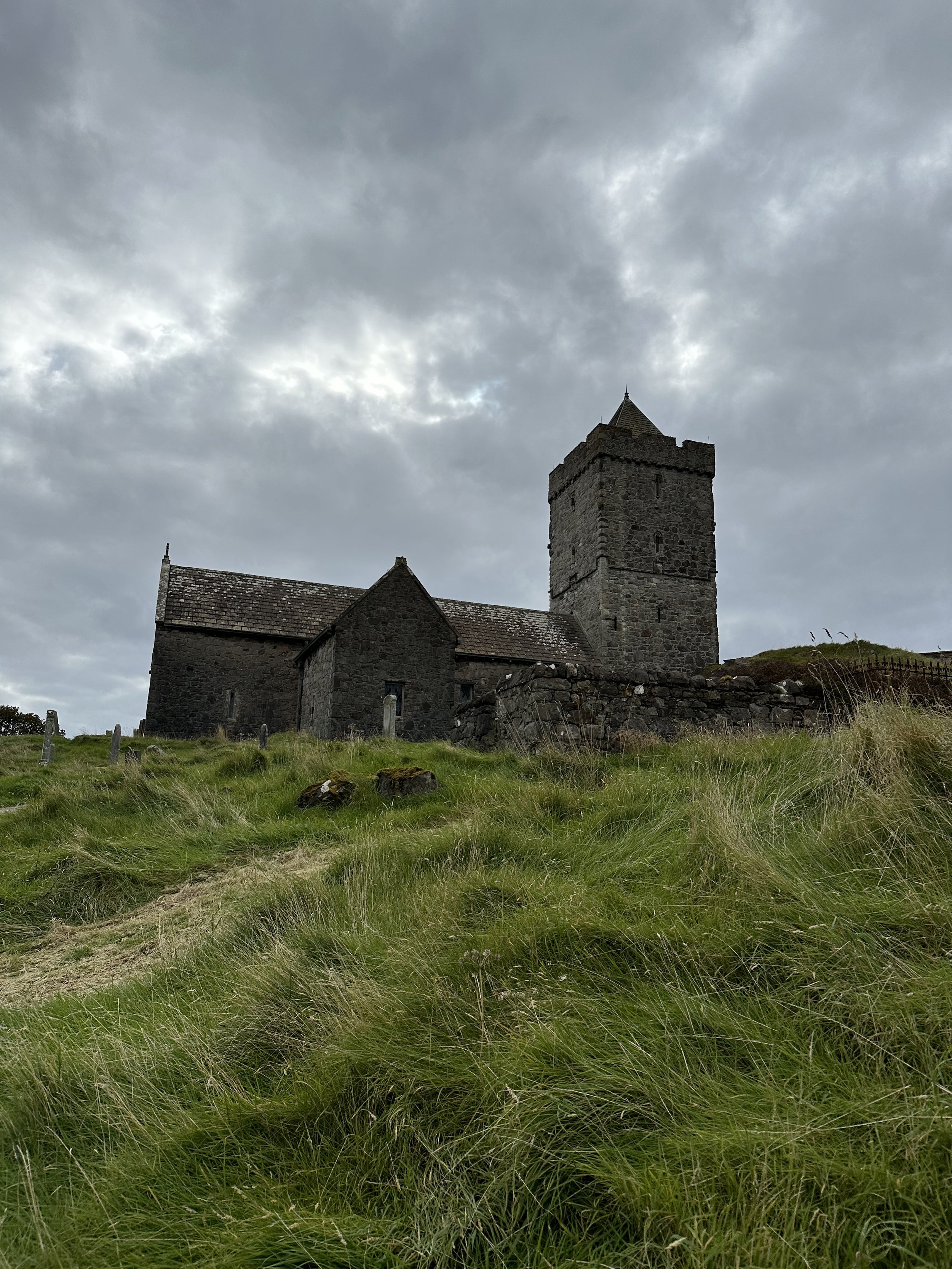 "The town’s emptiness is offset by eerie, “SACRED HARP” CHORAL SINGING that echoes from inside the daunting Kirk. "
(p12)