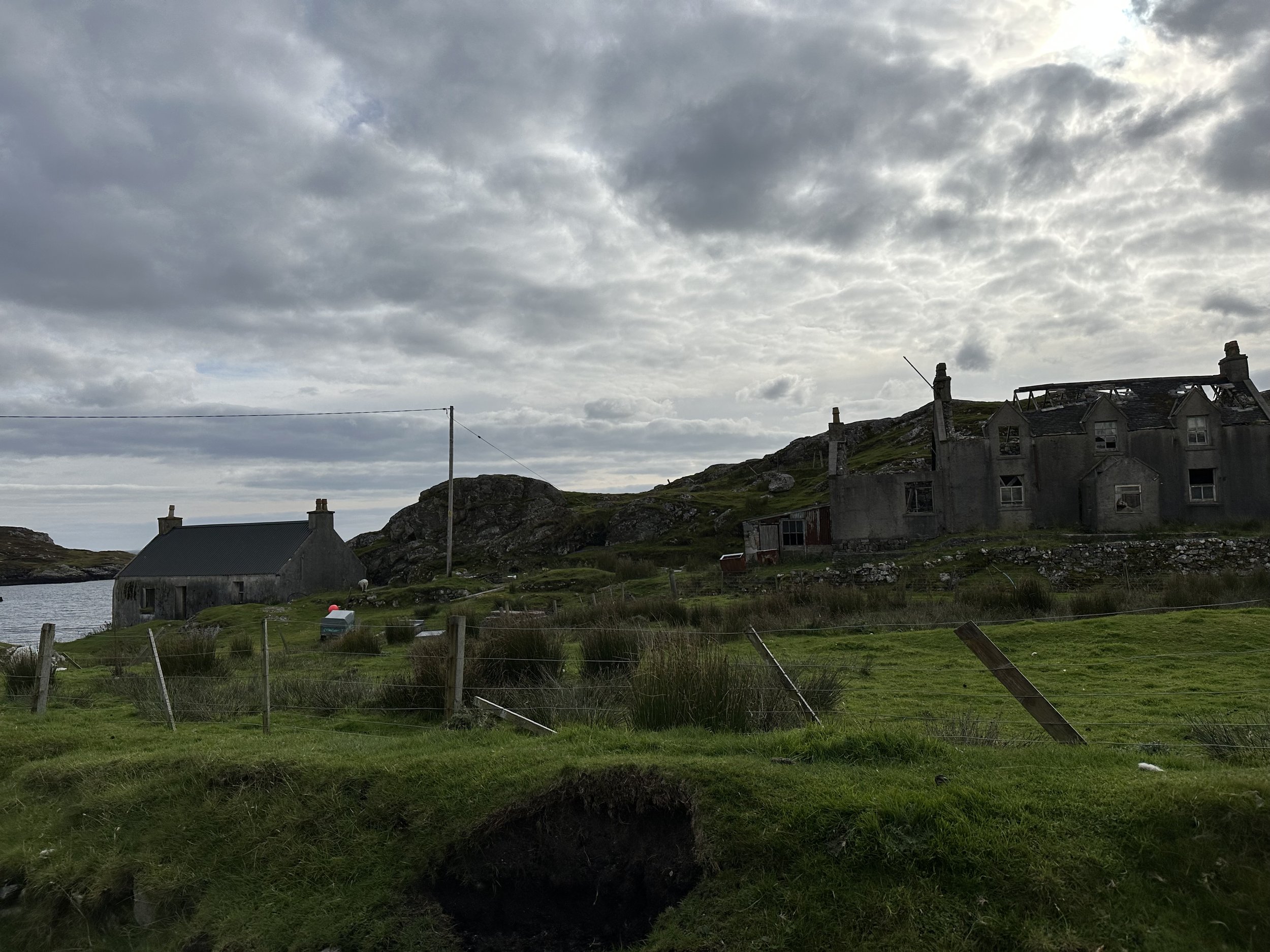 "The town sign reads: “ÀITE CRÌCHE / THE MARCH”.
Stone. Slate. Cold. Damp. A set of fishermen’s cottages lead to a Free Kirk and a battered Inn."
(p12)