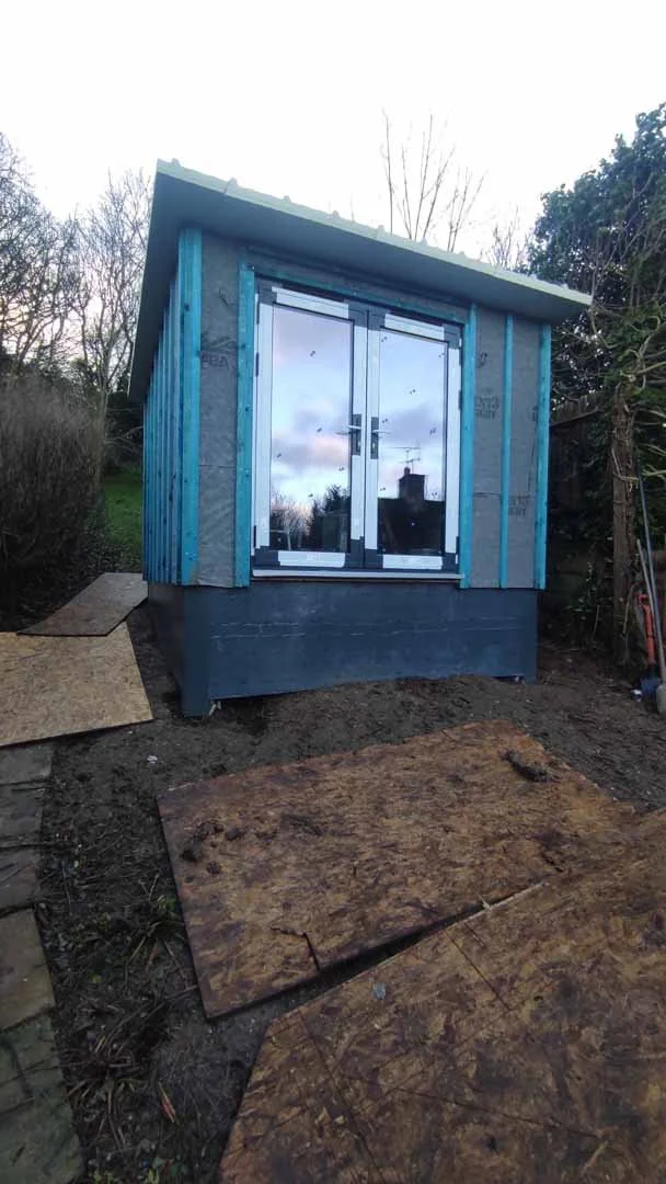 1m of fall visible at front of build before cladding and decking installation