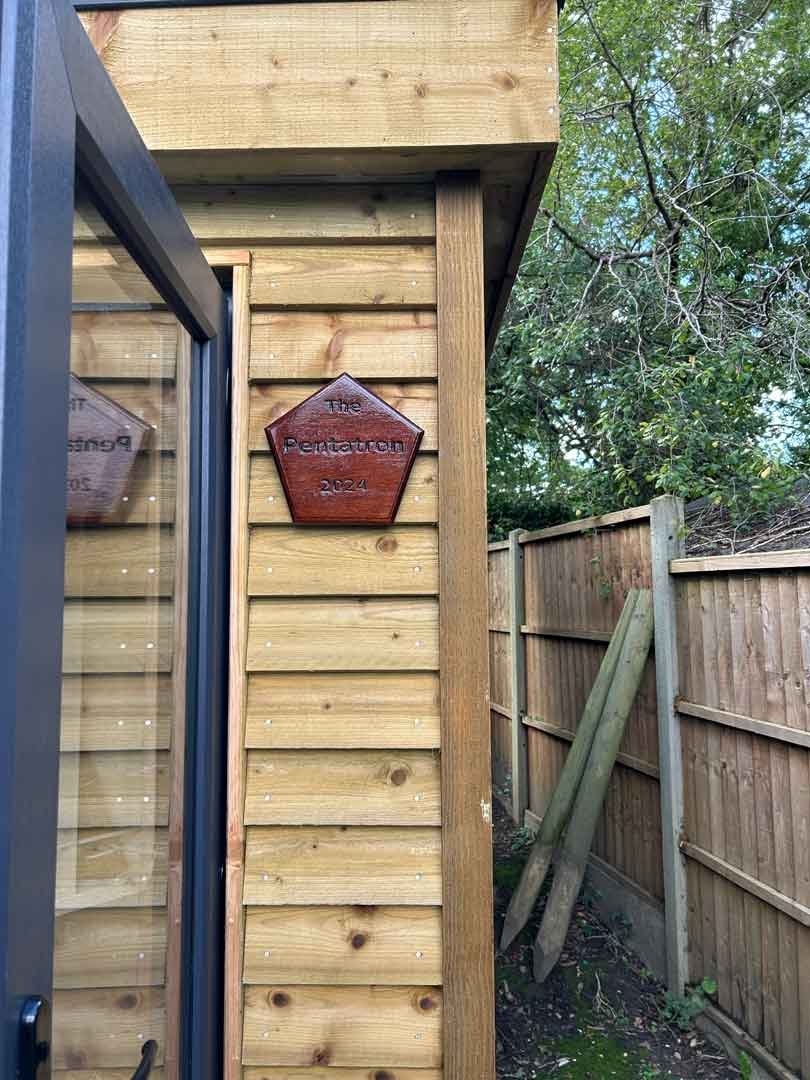 pentagonal garden room sign