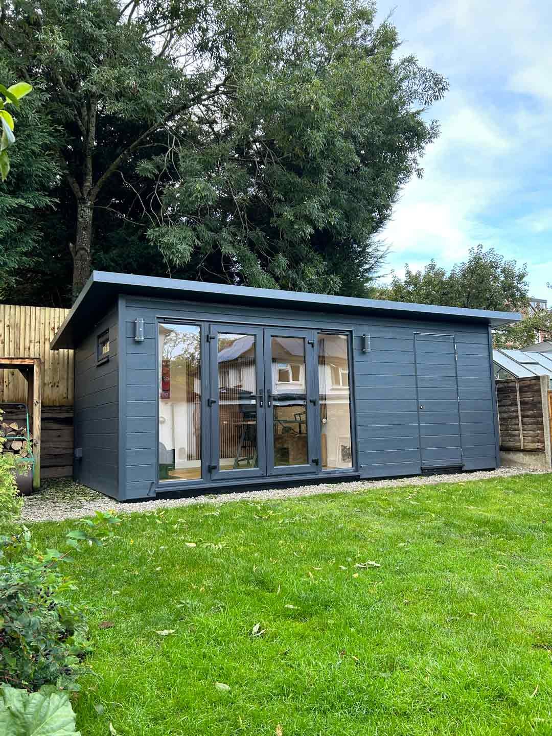Garden Room with Bike Shed in Reigate with Anthracite Grey outside, windows and doors.