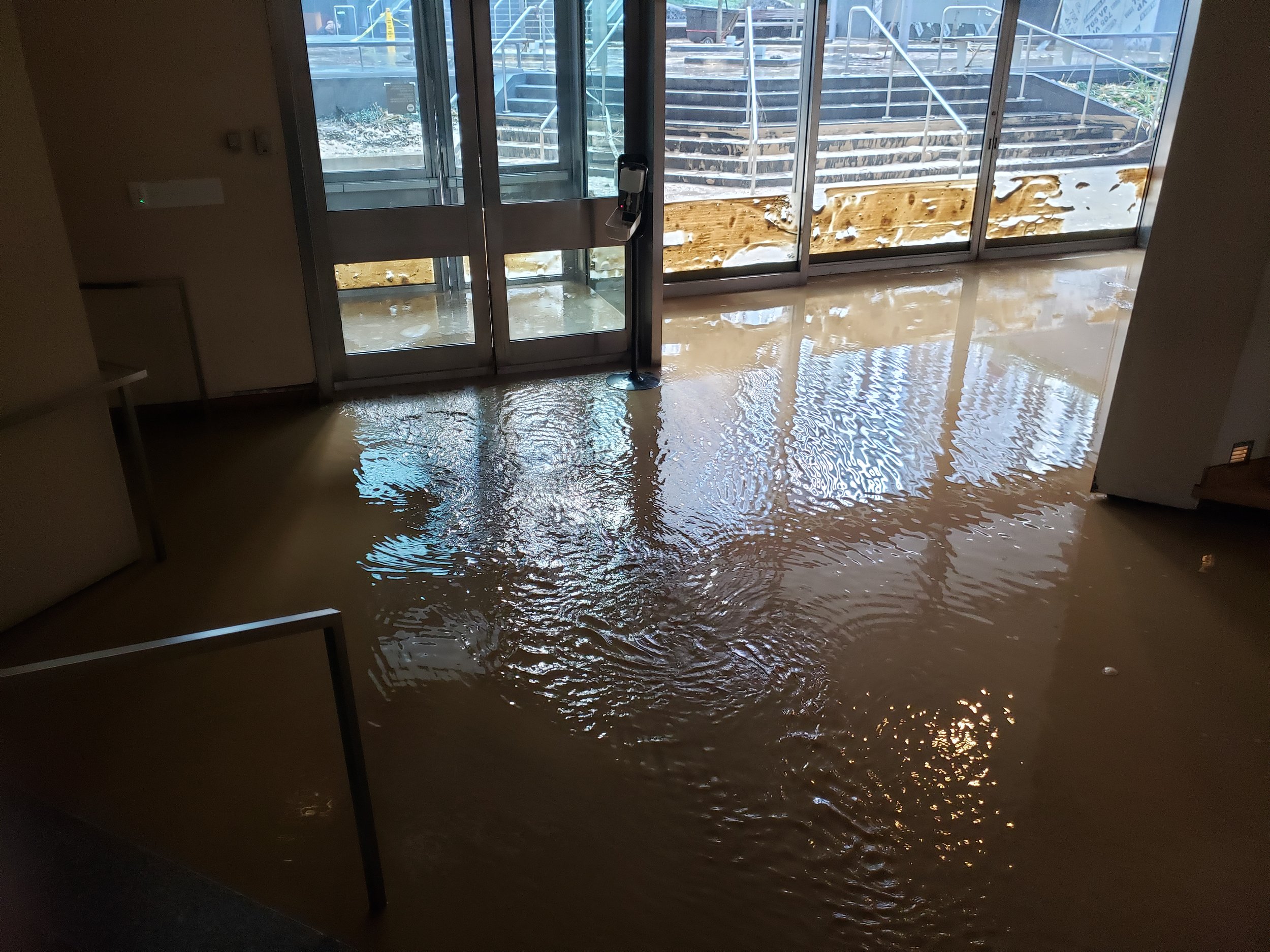 An image of the flooding in the Vignelli-designed interiors following the municipal water main break in 2021 that sent water and mud flowing into the building and requiring full overhaul of the multiple spaces.