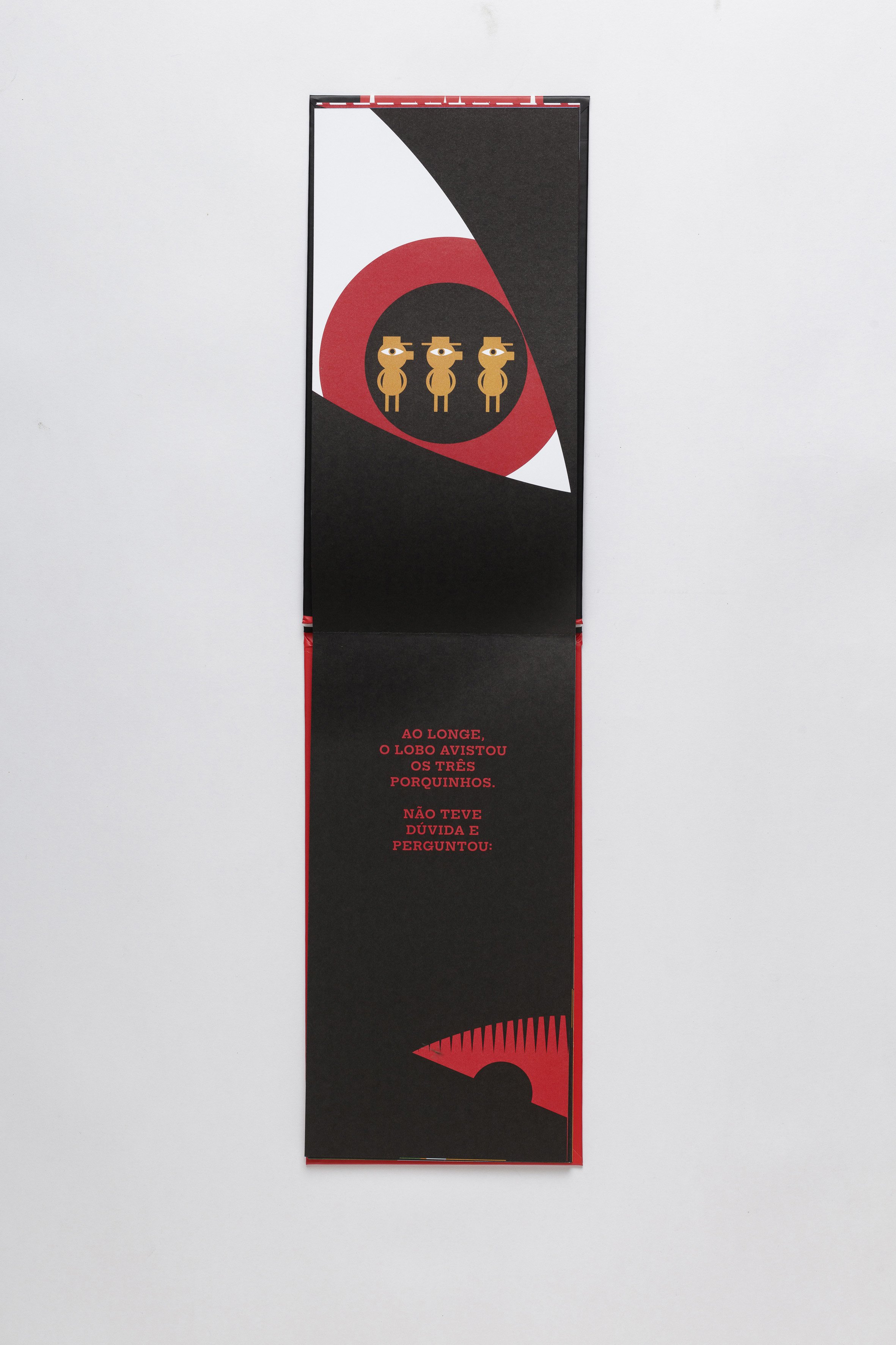 Narrative picturebook spread using scale contrast inside the wolf’s open eye