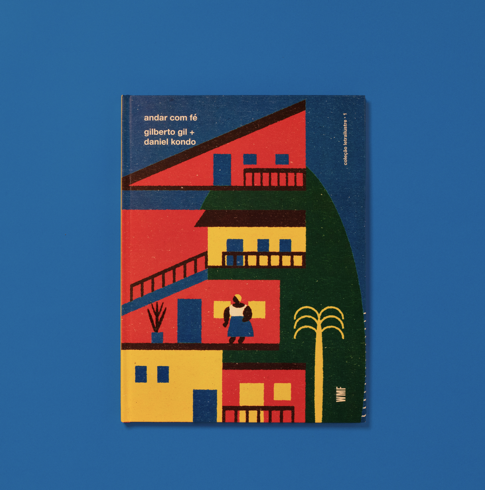 Colorful illustrated book cover featuring abstract building houses, a person, and greenery on a blue background.