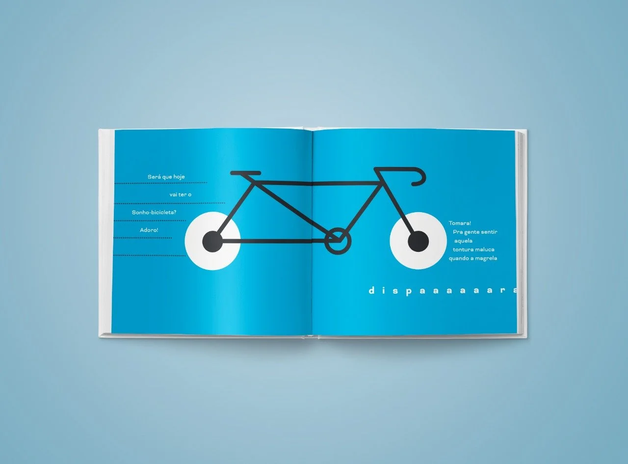 Dupla de páginas de Sonhozzz com bicicleta construída a partir de formas geométricas