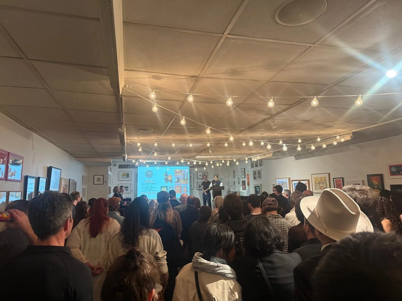 Opening night at the Society of Illustrators.
A shared moment around the works.