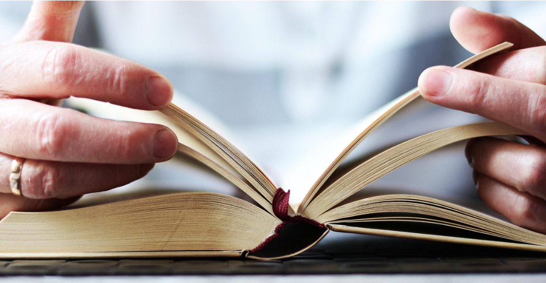 Hands holding Bible