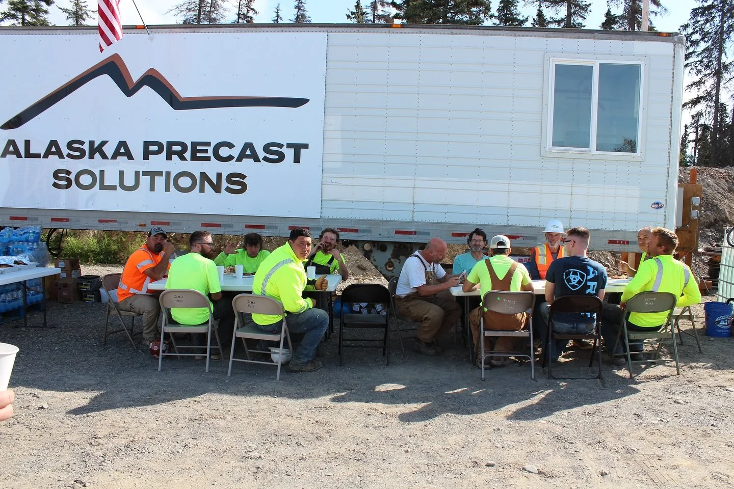 Hard hats off, forks up. 🍽️ 💪 After a morning of pouring, lifting, and keeping Alaska&rsquo;s first #hollowcore precast plant on track, the APS crew knows how to refuel.

Because building something this big takes more than concrete&mdash;it takes t